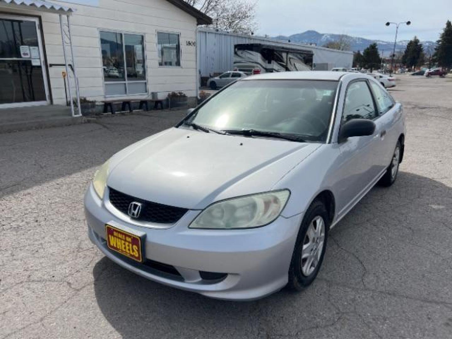 2005 Honda Civic VP Coupe w/ Front Si (1HGEM21385L) with an 1.7L L4 SOHC 16V engine, 5-Speed Manual transmission, located at 1800 West Broadway, Missoula, 59808, (406) 543-1986, 46.881348, -114.023628 - Photo#0