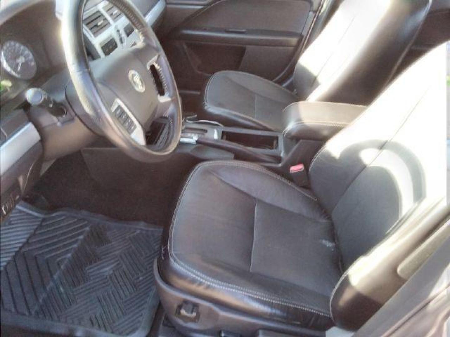 2006 Mercury Milan V6 Premier (3MEHM08196R) with an 3.0L V6 DOHC 24V engine, 6-Speed Automatic transmission, located at 4047 Montana Ave., Billings, MT, 59101, 45.770847, -108.529800 - Photo#9