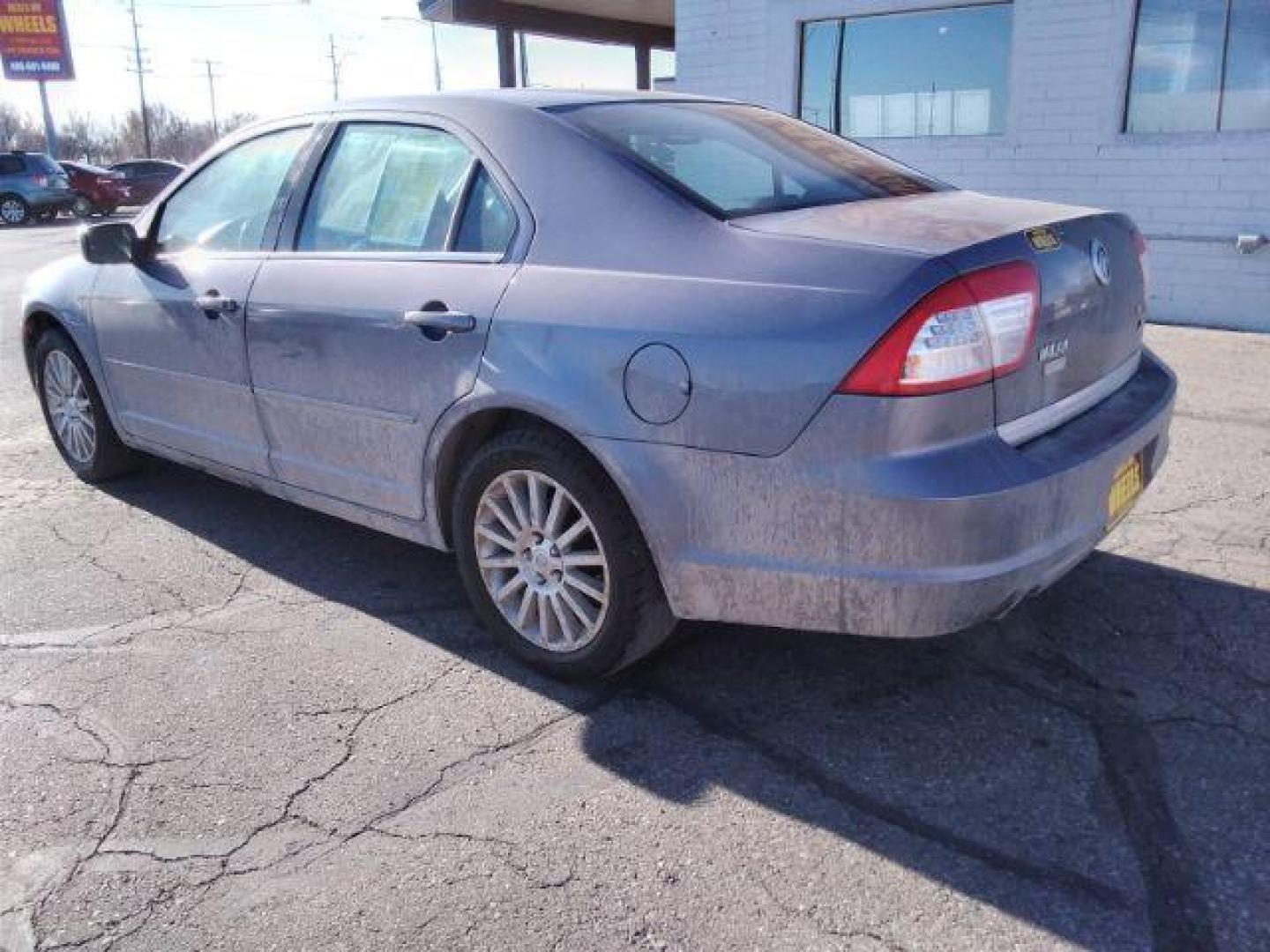 2006 Mercury Milan V6 Premier (3MEHM08196R) with an 3.0L V6 DOHC 24V engine, 6-Speed Automatic transmission, located at 4047 Montana Ave., Billings, MT, 59101, 45.770847, -108.529800 - Photo#6