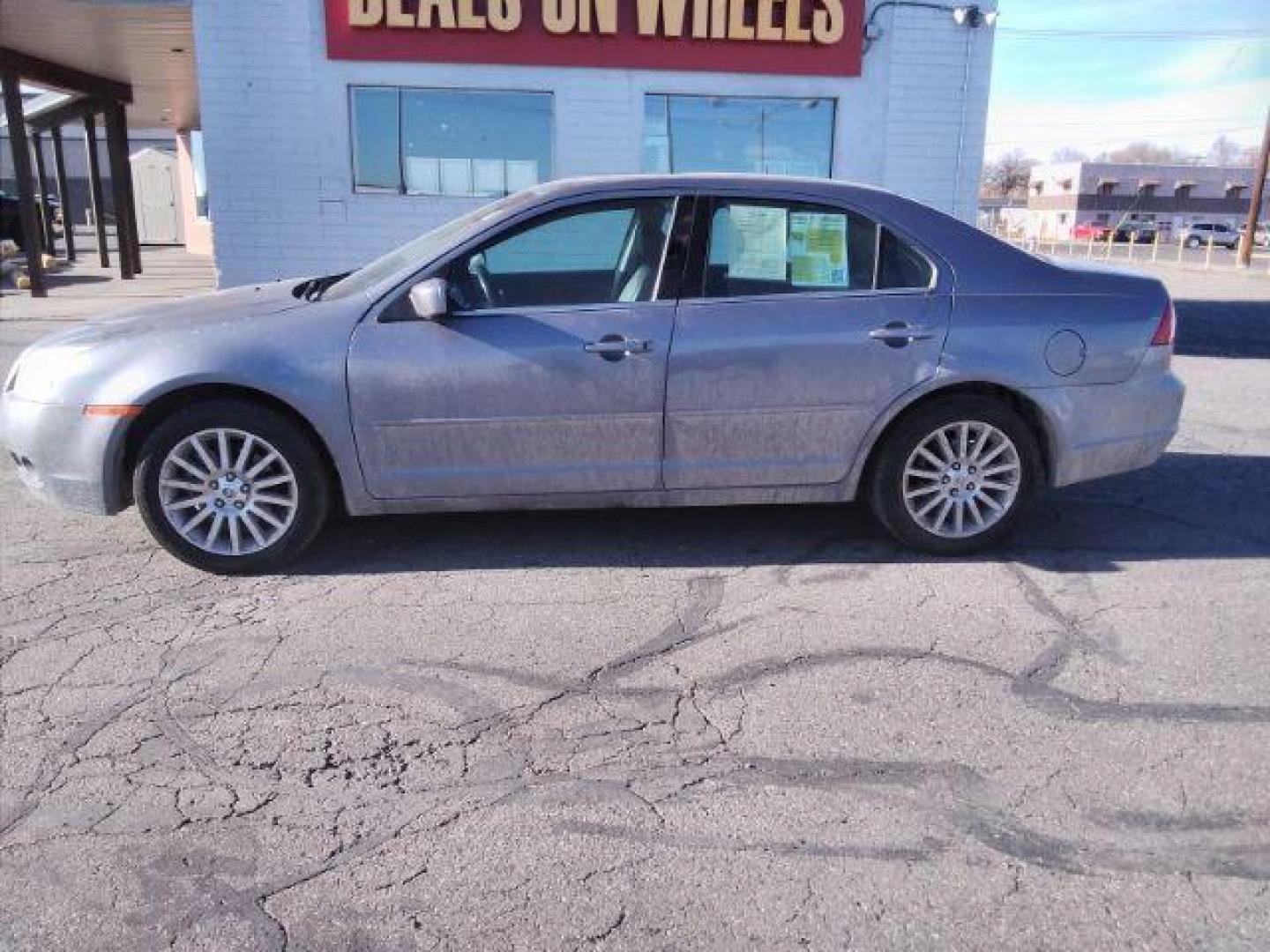 2006 Mercury Milan V6 Premier (3MEHM08196R) with an 3.0L V6 DOHC 24V engine, 6-Speed Automatic transmission, located at 4047 Montana Ave., Billings, MT, 59101, 45.770847, -108.529800 - Photo#7