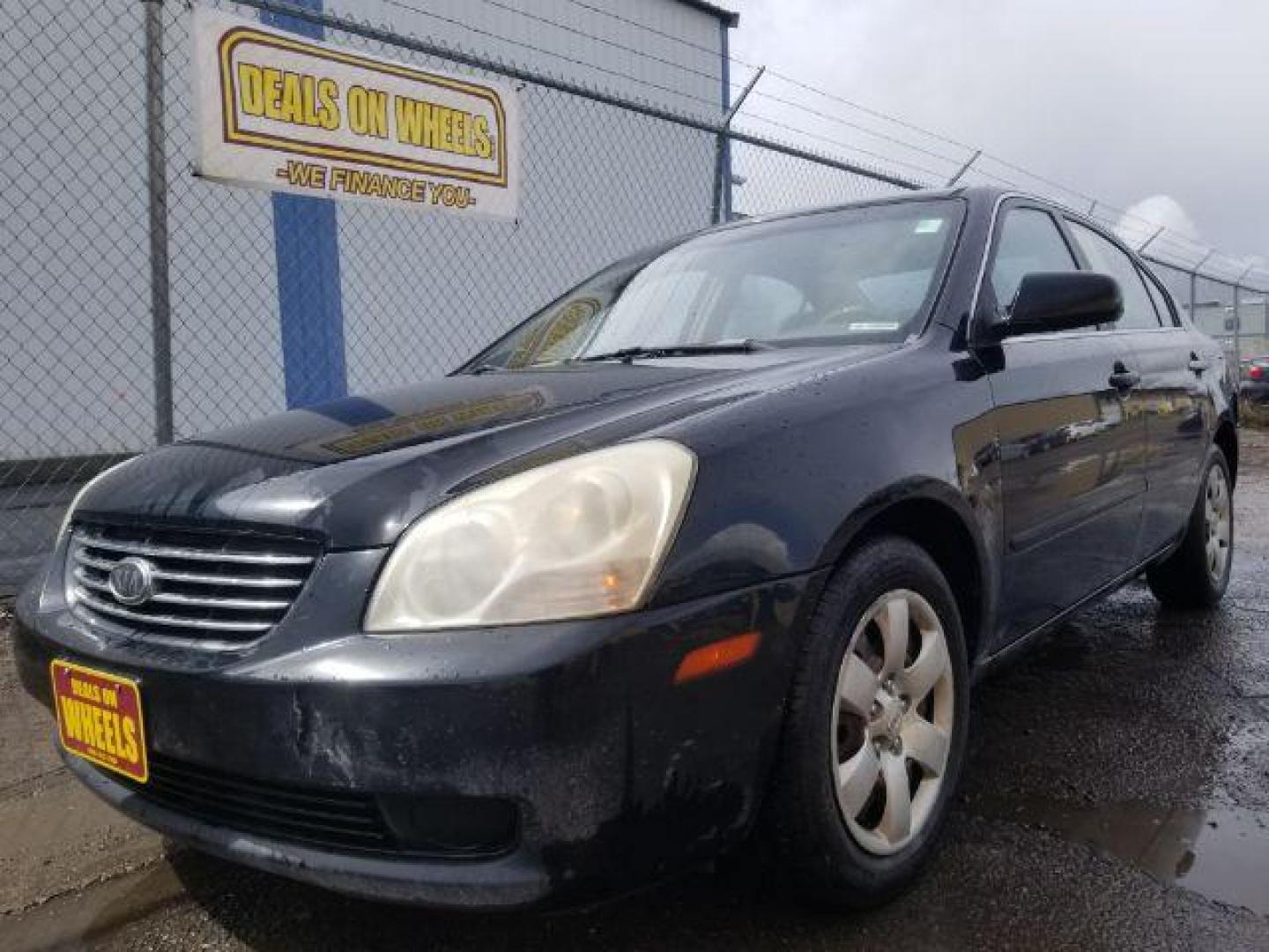 2007 Kia Optima LX (KNAGE123X75) with an 2.4L L4 DOHC 16V engine, 4-Speed Automatic transmission, located at 601 E. Idaho St., Kalispell, MT, 59901, 0.000000, 0.000000 - Photo#0