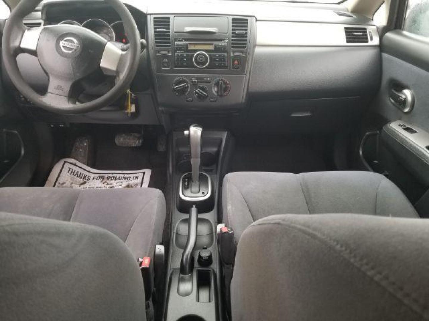 2007 Nissan Versa 1.8S (3N1BC13E07L) with an 1.8L I-4 DOHC engine, located at 4047 Montana Ave., Billings, MT, 59101, 45.770847, -108.529800 - Photo#11