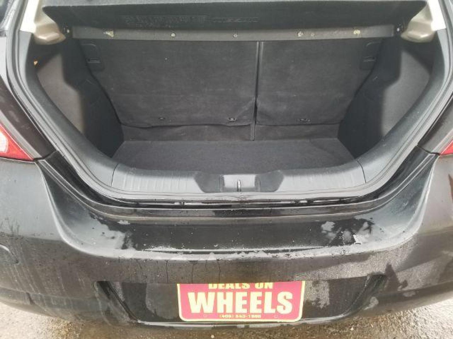 2007 Nissan Versa 1.8S (3N1BC13E07L) with an 1.8L I-4 DOHC engine, located at 4047 Montana Ave., Billings, MT, 59101, 45.770847, -108.529800 - Photo#12