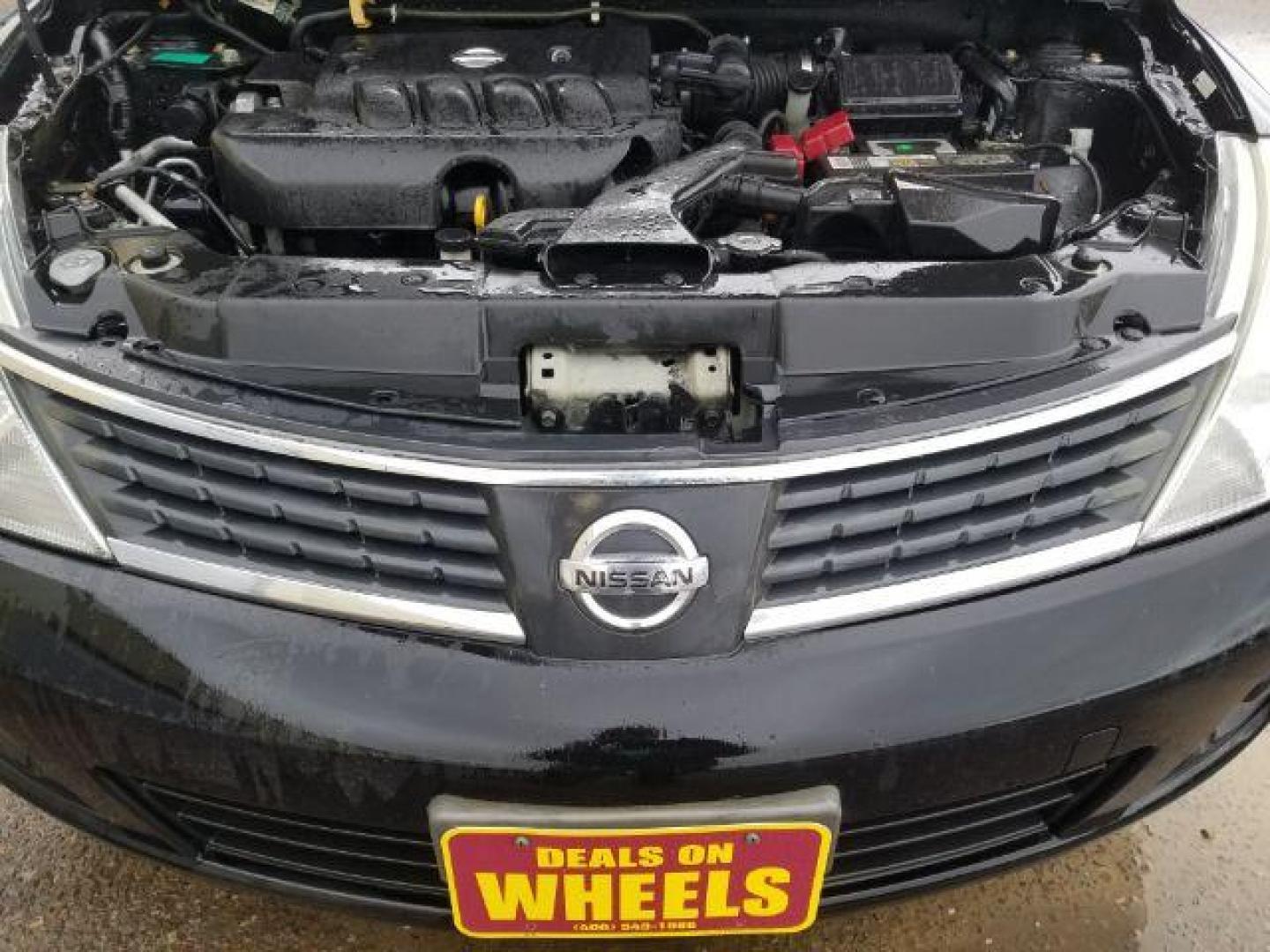 2007 Nissan Versa 1.8S (3N1BC13E07L) with an 1.8L I-4 DOHC engine, located at 4047 Montana Ave., Billings, MT, 59101, 45.770847, -108.529800 - Photo#13