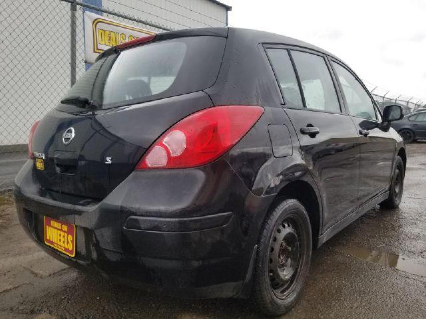 2007 Nissan Versa 1.8S (3N1BC13E07L) with an 1.8L I-4 DOHC engine, located at 4047 Montana Ave., Billings, MT, 59101, 45.770847, -108.529800 - Photo#4