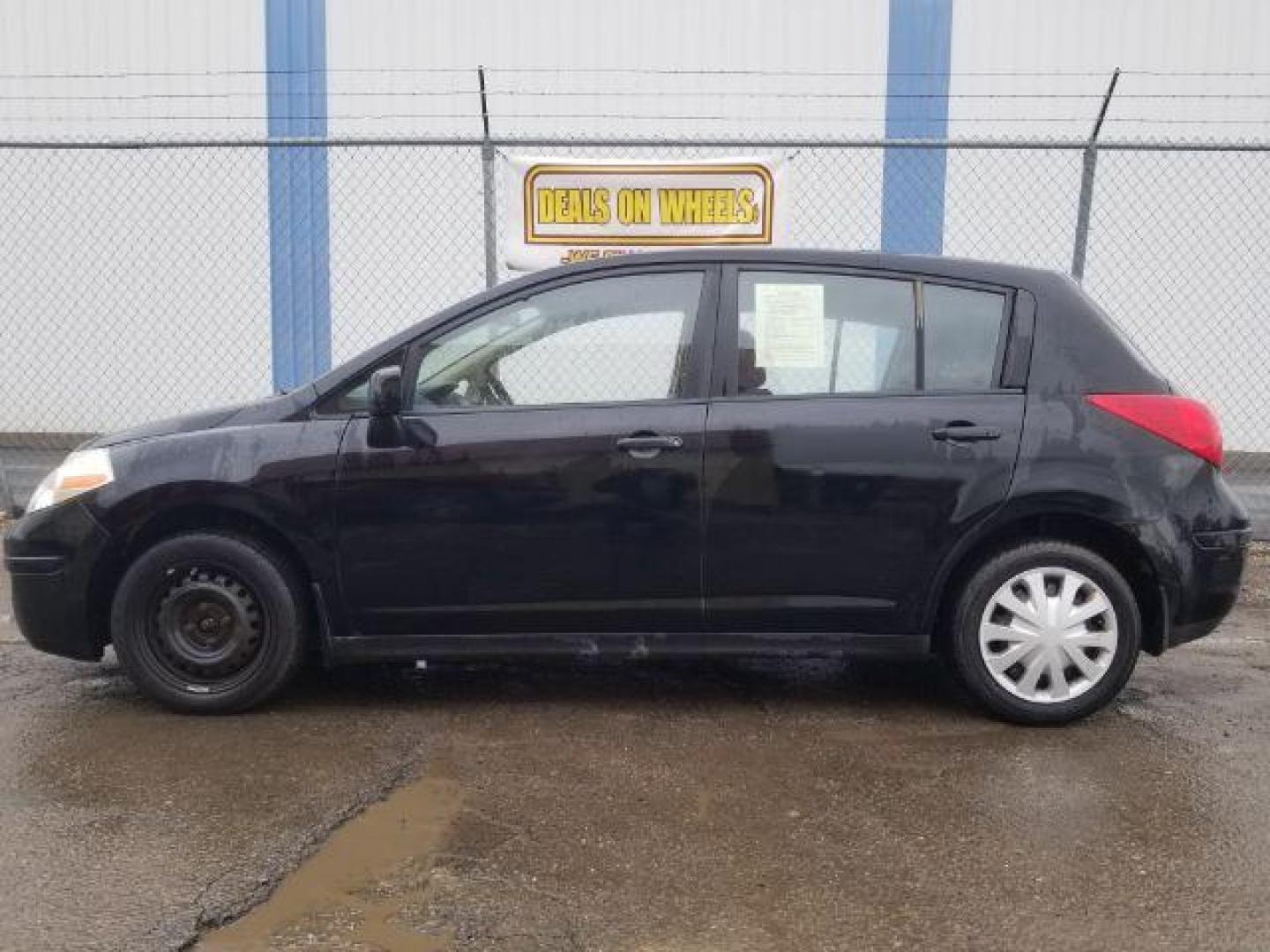 2007 Nissan Versa 1.8S (3N1BC13E07L) with an 1.8L I-4 DOHC engine, located at 4047 Montana Ave., Billings, MT, 59101, 45.770847, -108.529800 - Photo#6
