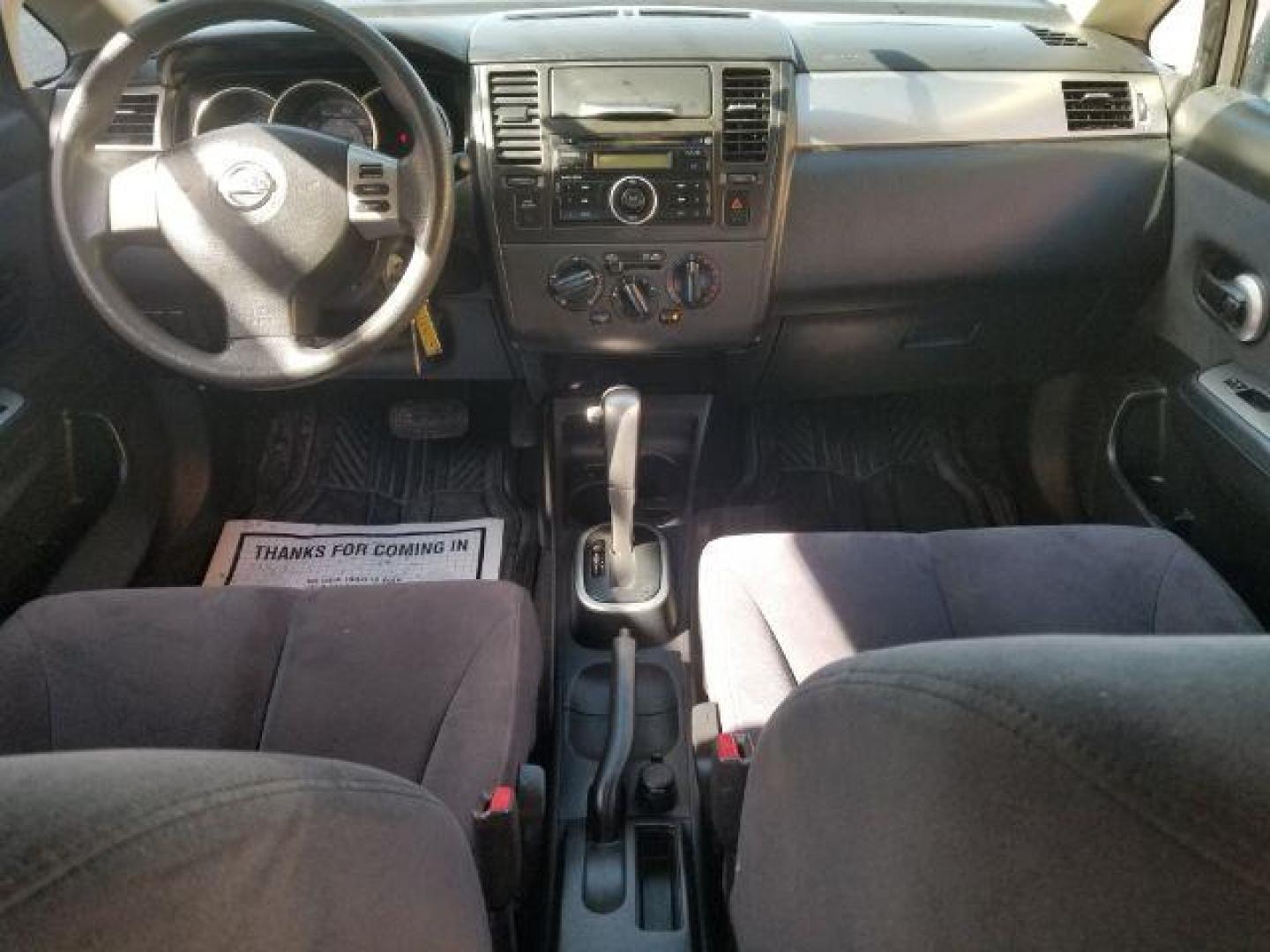 2008 Nissan Versa 1.8S (3N1BC11E28L) with an 1.8L I-4 DOHC engine, located at 4047 Montana Ave., Billings, MT, 59101, 45.770847, -108.529800 - Photo#10