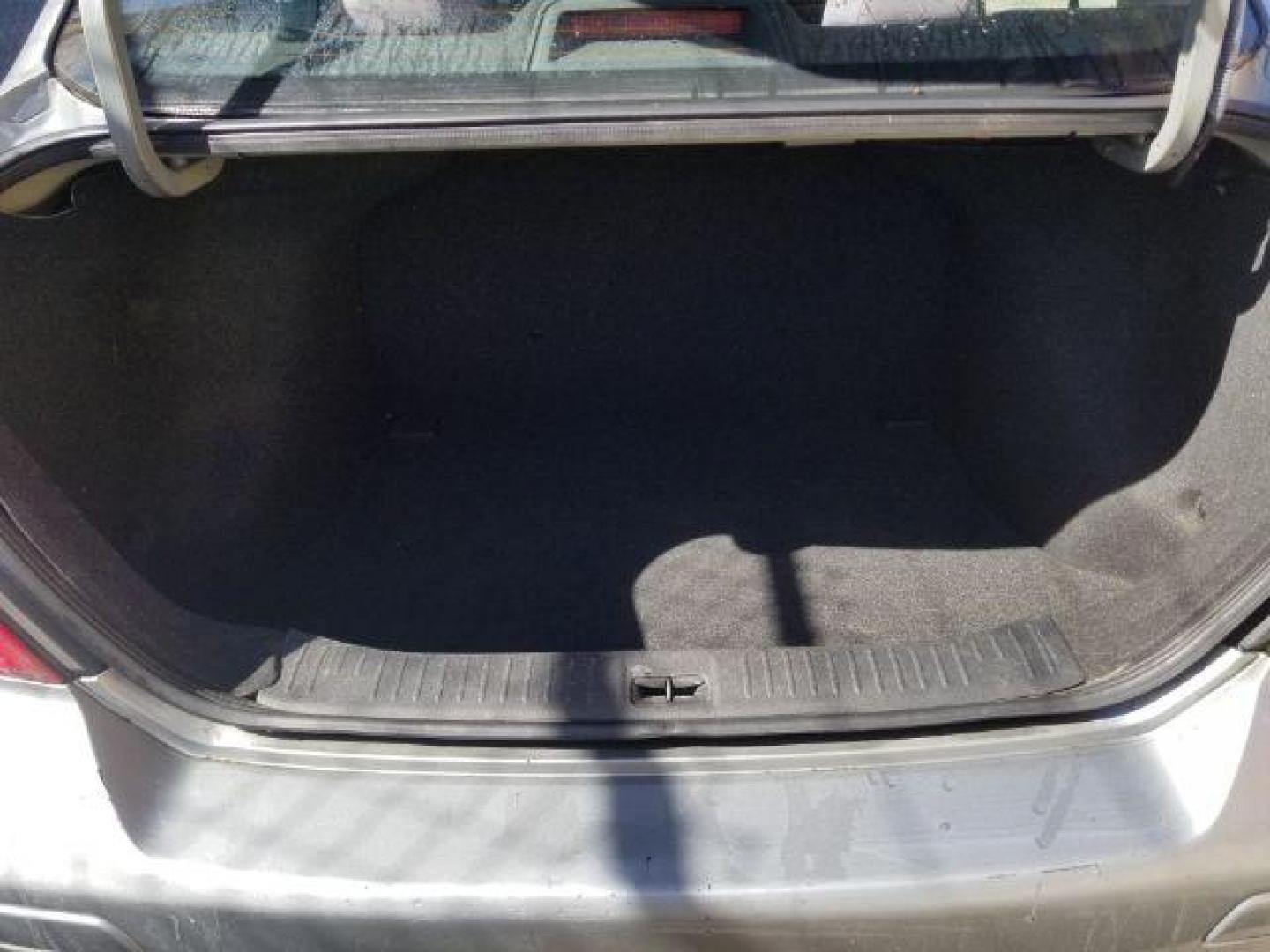 2008 Nissan Versa 1.8S (3N1BC11E28L) with an 1.8L I-4 DOHC engine, located at 4047 Montana Ave., Billings, MT, 59101, 45.770847, -108.529800 - Photo#12