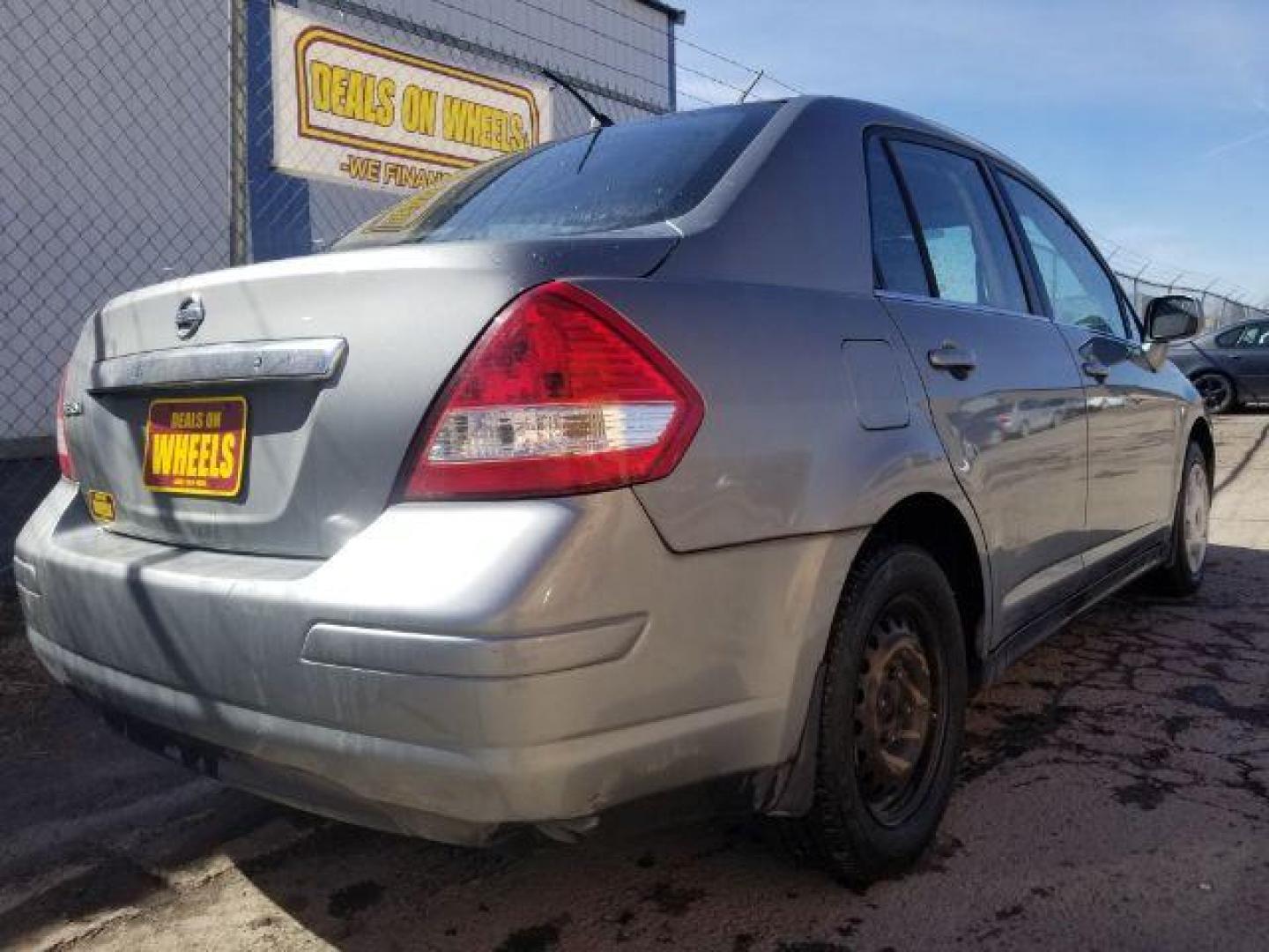 2008 Nissan Versa 1.8S (3N1BC11E28L) with an 1.8L I-4 DOHC engine, located at 4047 Montana Ave., Billings, MT, 59101, 45.770847, -108.529800 - Photo#4