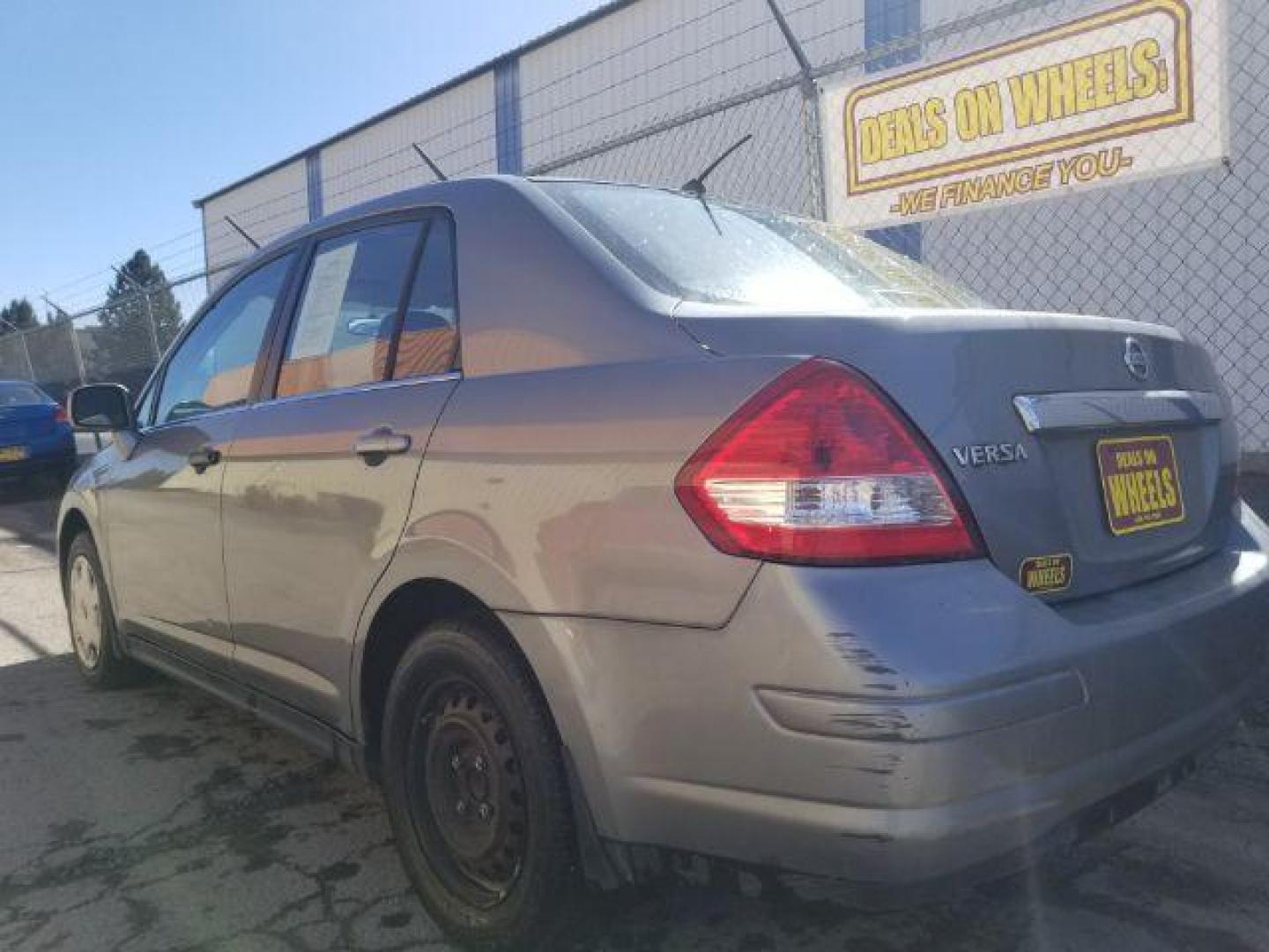 2008 Nissan Versa 1.8S (3N1BC11E28L) with an 1.8L I-4 DOHC engine, located at 4047 Montana Ave., Billings, MT, 59101, 45.770847, -108.529800 - Photo#5