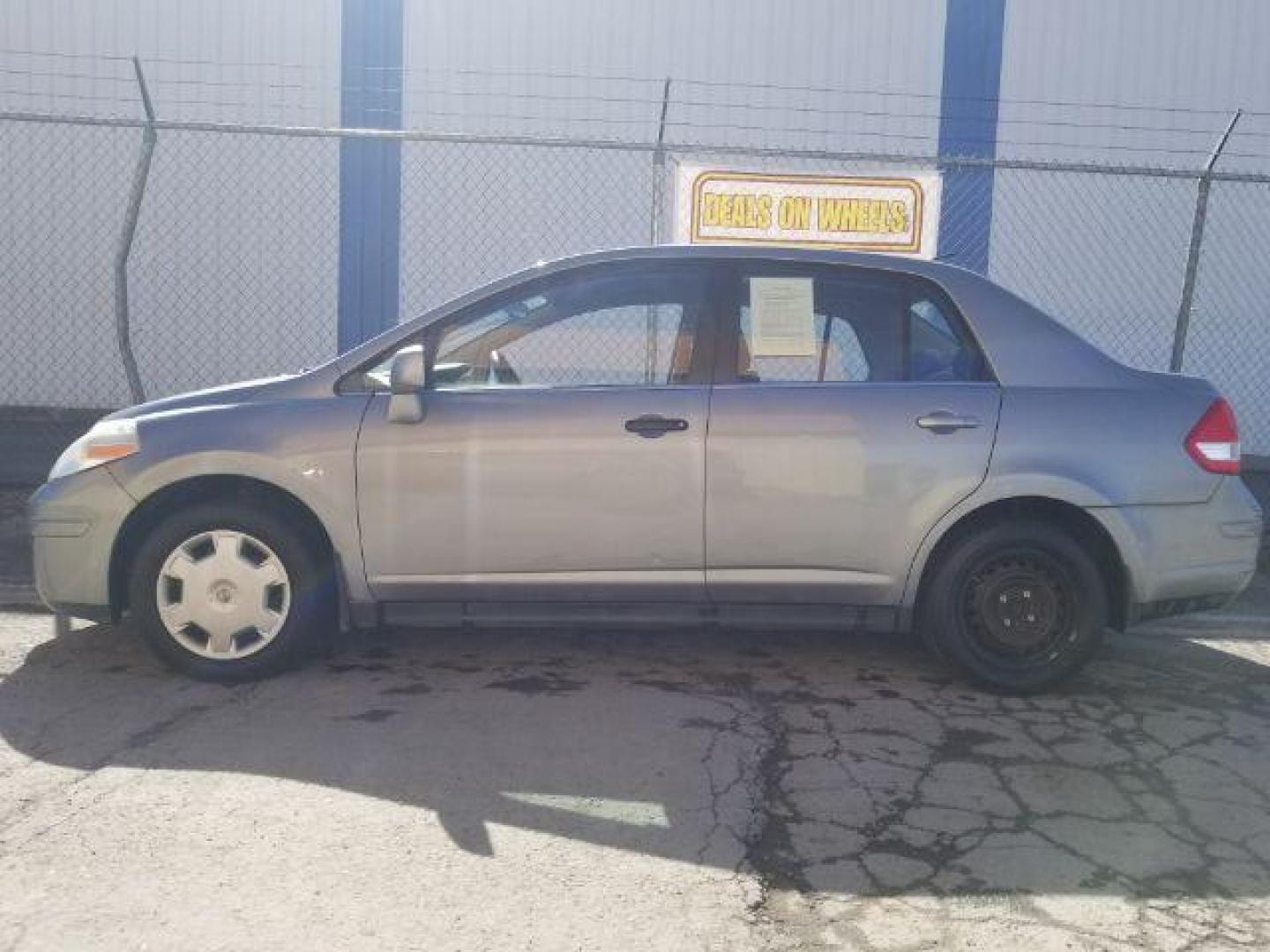 2008 Nissan Versa 1.8S (3N1BC11E28L) with an 1.8L I-4 DOHC engine, located at 4047 Montana Ave., Billings, MT, 59101, 45.770847, -108.529800 - Photo#6