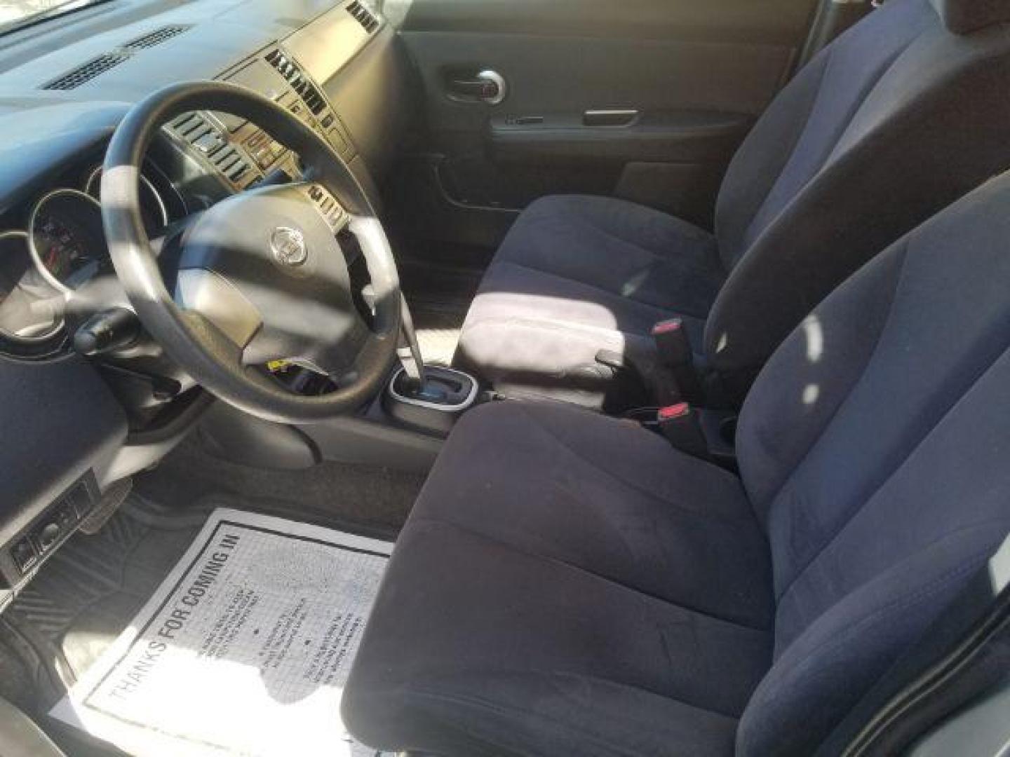 2008 Nissan Versa 1.8S (3N1BC11E28L) with an 1.8L I-4 DOHC engine, located at 4047 Montana Ave., Billings, MT, 59101, 45.770847, -108.529800 - Photo#7