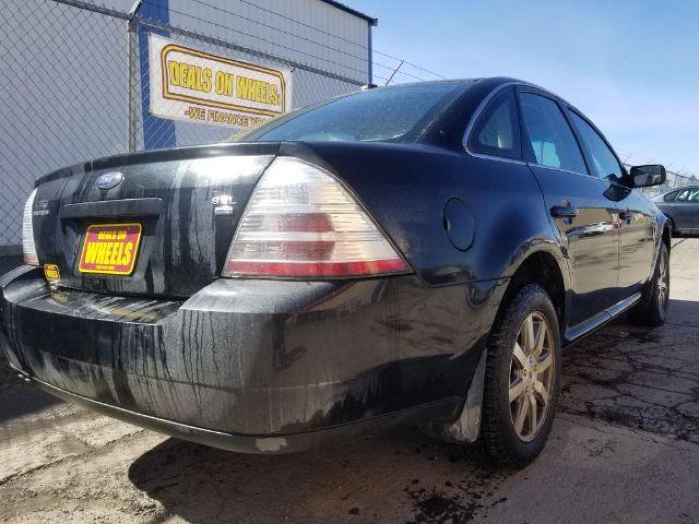 2009 Ford Taurus SEL (1FAHP27W59G) with an Duratec 3.5L V-6 DOHC engine, located at 4047 Montana Ave., Billings, MT, 59101, 45.770847, -108.529800 - Photo#4