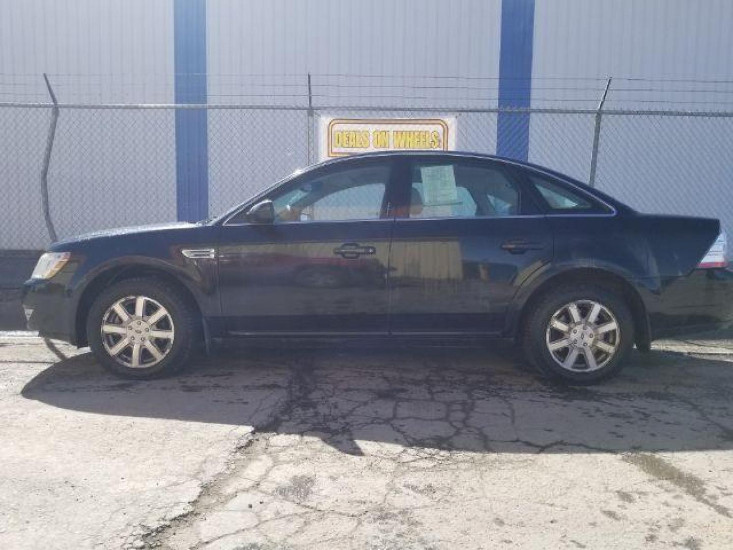 2009 Ford Taurus SEL (1FAHP27W59G) with an Duratec 3.5L V-6 DOHC engine, located at 4047 Montana Ave., Billings, MT, 59101, 45.770847, -108.529800 - Photo#6
