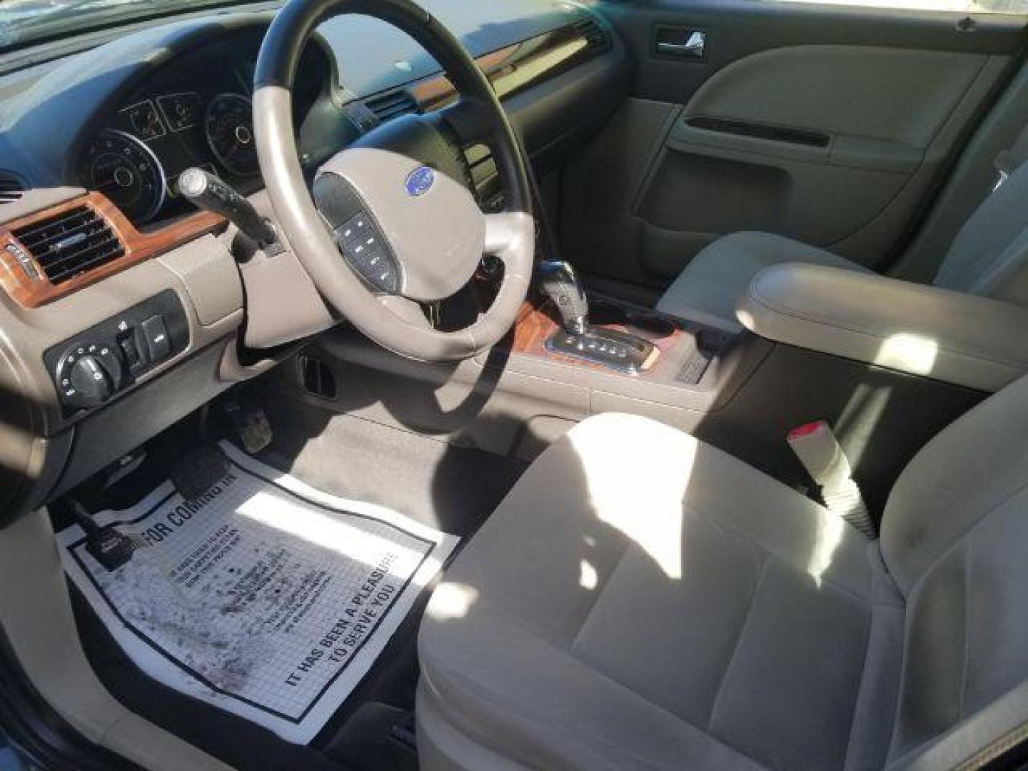 2009 Ford Taurus SEL (1FAHP27W59G) with an Duratec 3.5L V-6 DOHC engine, located at 4047 Montana Ave., Billings, MT, 59101, 45.770847, -108.529800 - Photo#7