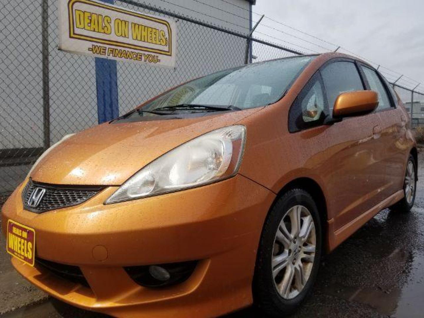 2009 Honda Fit Sport (JHMGE88639S) with an 1.5L I-4 i-VTEC variable valve control engine, located at 4801 10th Ave S,, Great Falls, MT, 59405, 0.000000, 0.000000 - Photo#0