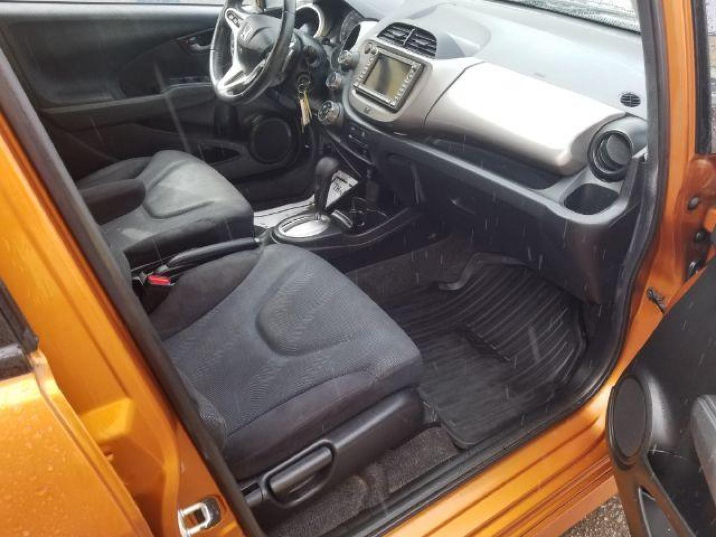 2009 Honda Fit Sport (JHMGE88639S) with an 1.5L I-4 i-VTEC variable valve control engine, located at 4801 10th Ave S,, Great Falls, MT, 59405, 0.000000, 0.000000 - Photo#10