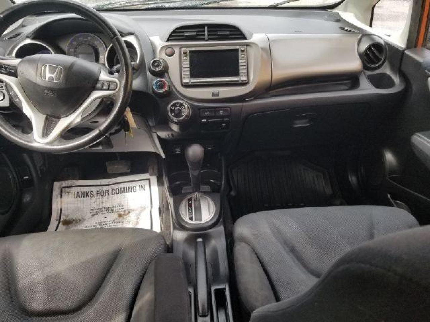 2009 Honda Fit Sport (JHMGE88639S) with an 1.5L I-4 i-VTEC variable valve control engine, located at 4801 10th Ave S,, Great Falls, MT, 59405, 0.000000, 0.000000 - Photo#11