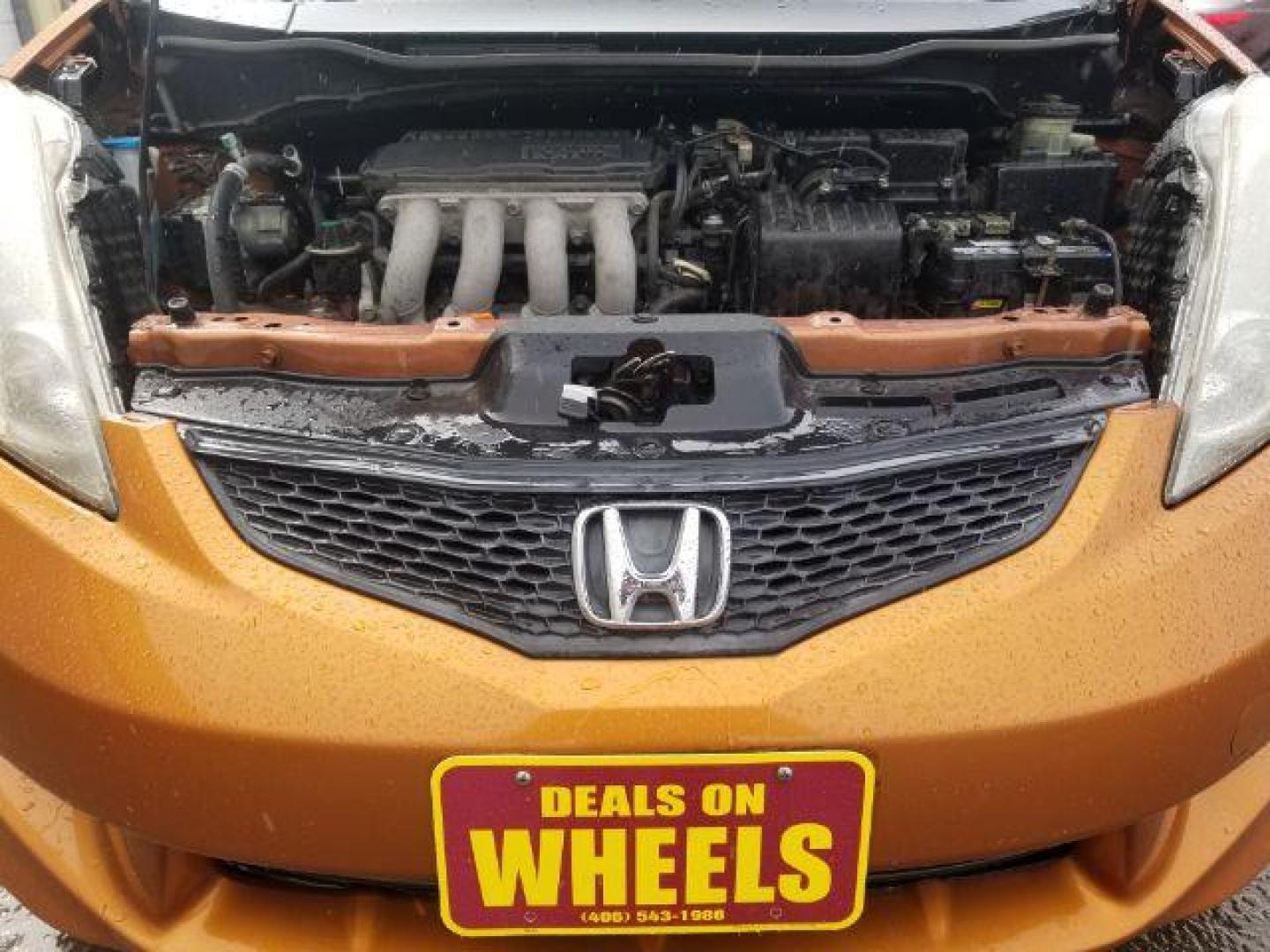 2009 Honda Fit Sport (JHMGE88639S) with an 1.5L I-4 i-VTEC variable valve control engine, located at 4801 10th Ave S,, Great Falls, MT, 59405, 0.000000, 0.000000 - Photo#13