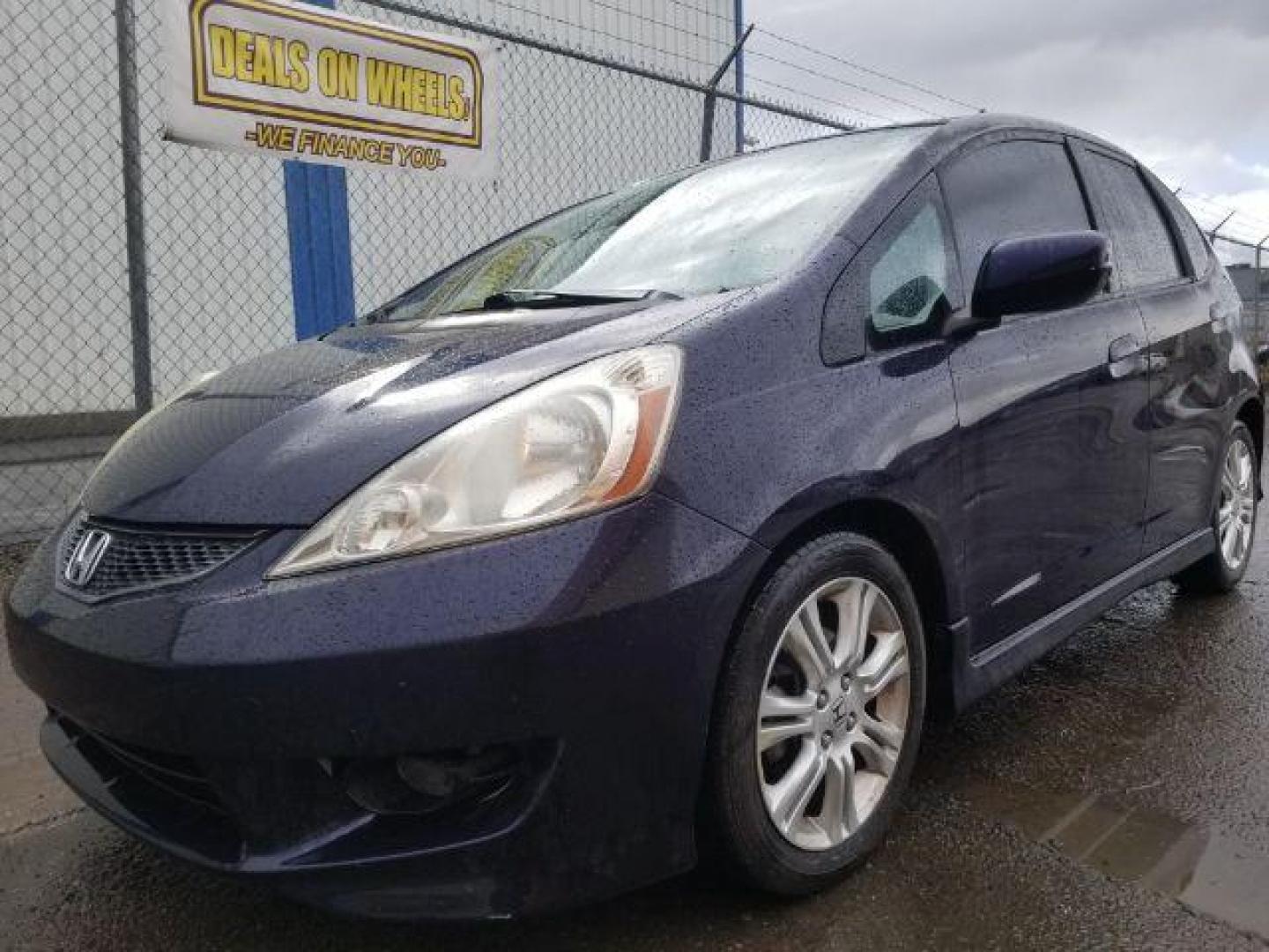 2009 Honda Fit Sport (JHMGE88439S) with an 1.5L I-4 i-VTEC variable valve control engine, located at 601 E. Idaho St., Kalispell, MT, 59901, 0.000000, 0.000000 - Photo#0
