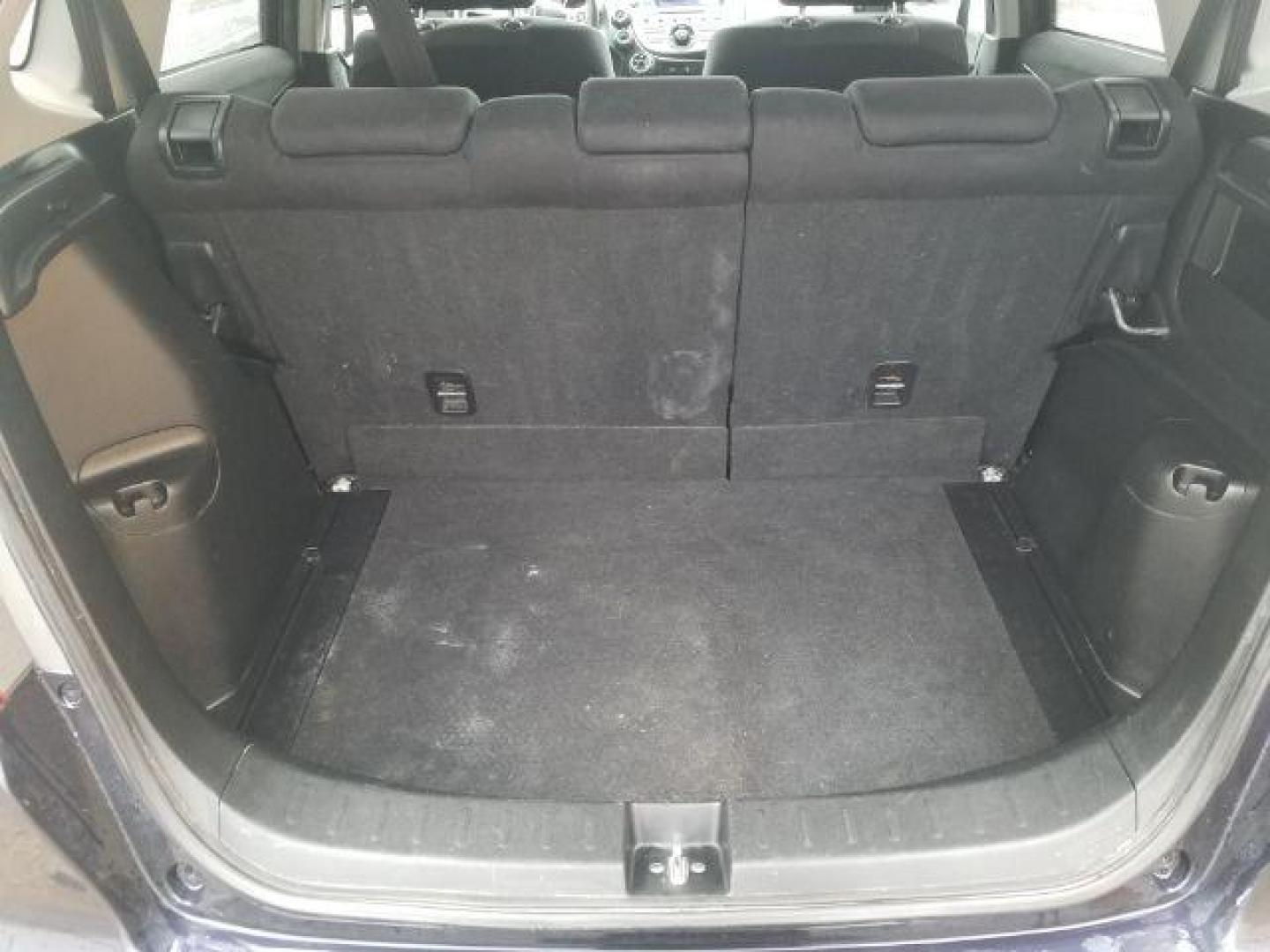 2009 Honda Fit Sport (JHMGE88439S) with an 1.5L I-4 i-VTEC variable valve control engine, located at 601 E. Idaho St., Kalispell, MT, 59901, 0.000000, 0.000000 - Photo#9