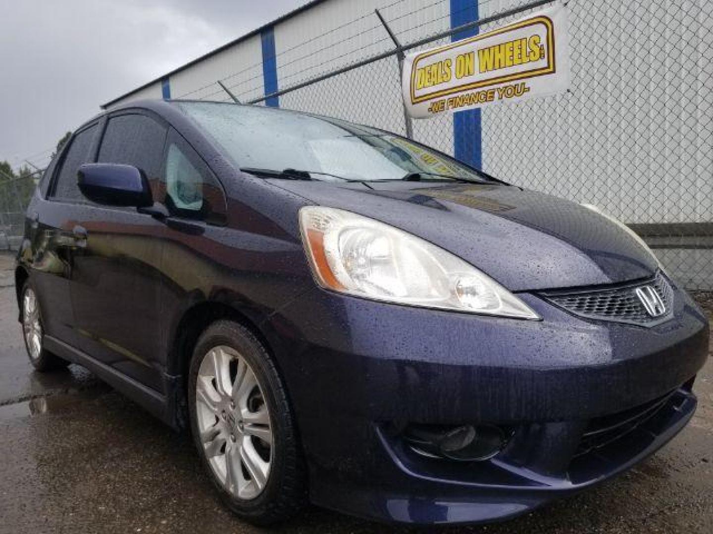 2009 Honda Fit Sport (JHMGE88439S) with an 1.5L I-4 i-VTEC variable valve control engine, located at 601 E. Idaho St., Kalispell, MT, 59901, 0.000000, 0.000000 - Photo#2