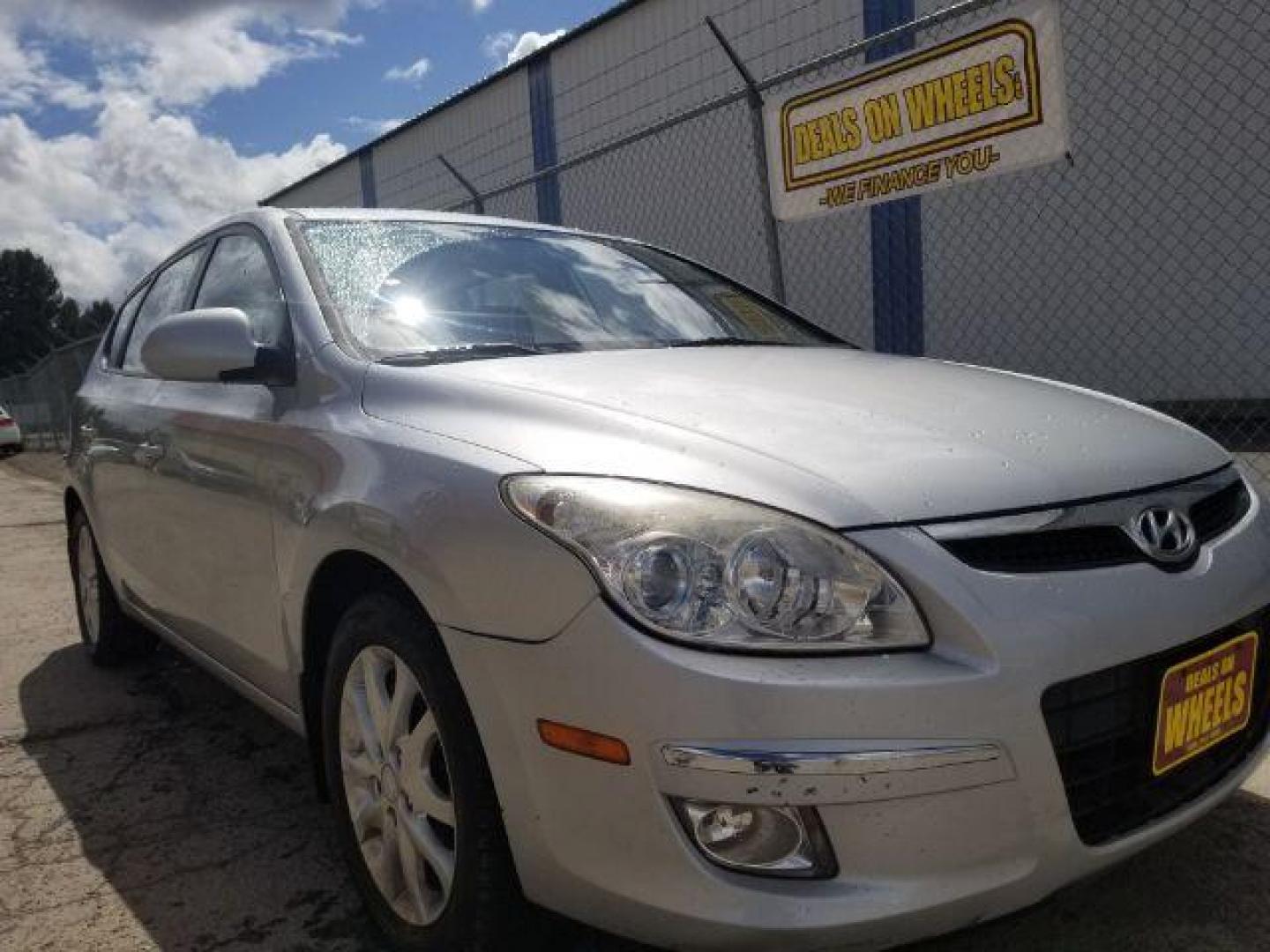 2009 Hyundai Elantra Touring GLS (KMHDC86E59U) , located at 4047 Montana Ave., Billings, MT, 59101, 45.770847, -108.529800 - Photo#2
