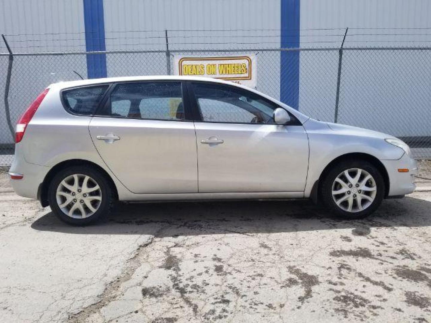 2009 Hyundai Elantra Touring GLS (KMHDC86E59U) , located at 4047 Montana Ave., Billings, MT, 59101, 45.770847, -108.529800 - Photo#3