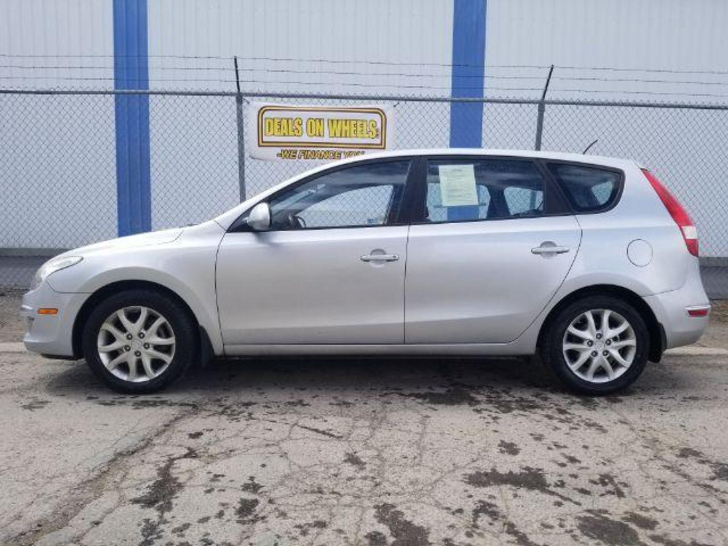 2009 Hyundai Elantra Touring GLS (KMHDC86E59U) , located at 4047 Montana Ave., Billings, MT, 59101, 45.770847, -108.529800 - Photo#6