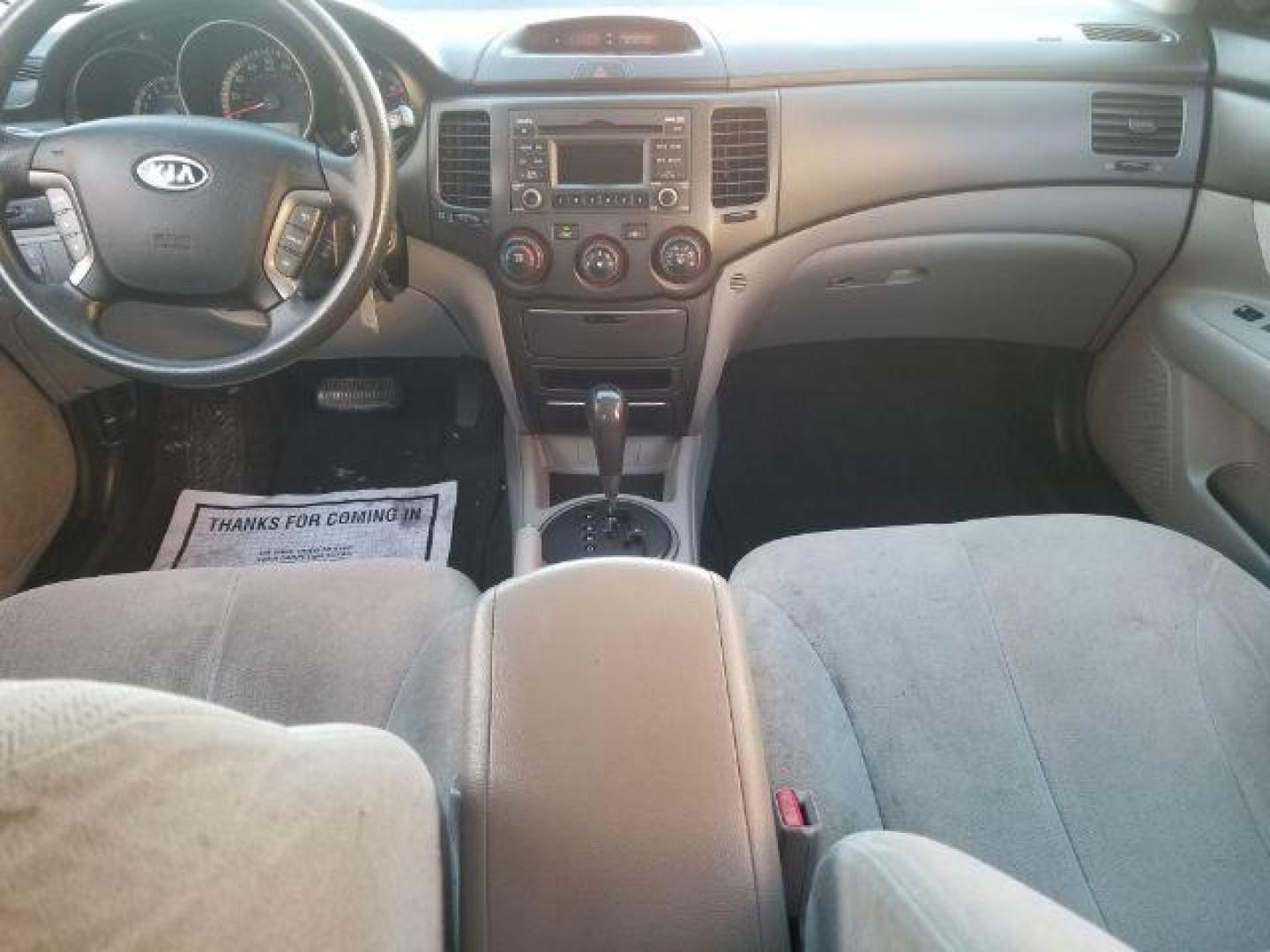 2009 Kia Optima LX (KNAGE228395) with an 2.4L L4 DOHC 16V engine, 4-Speed Automatic transmission, located at 1800 West Broadway, Missoula, 59808, (406) 543-1986, 46.881348, -114.023628 - Photo#11