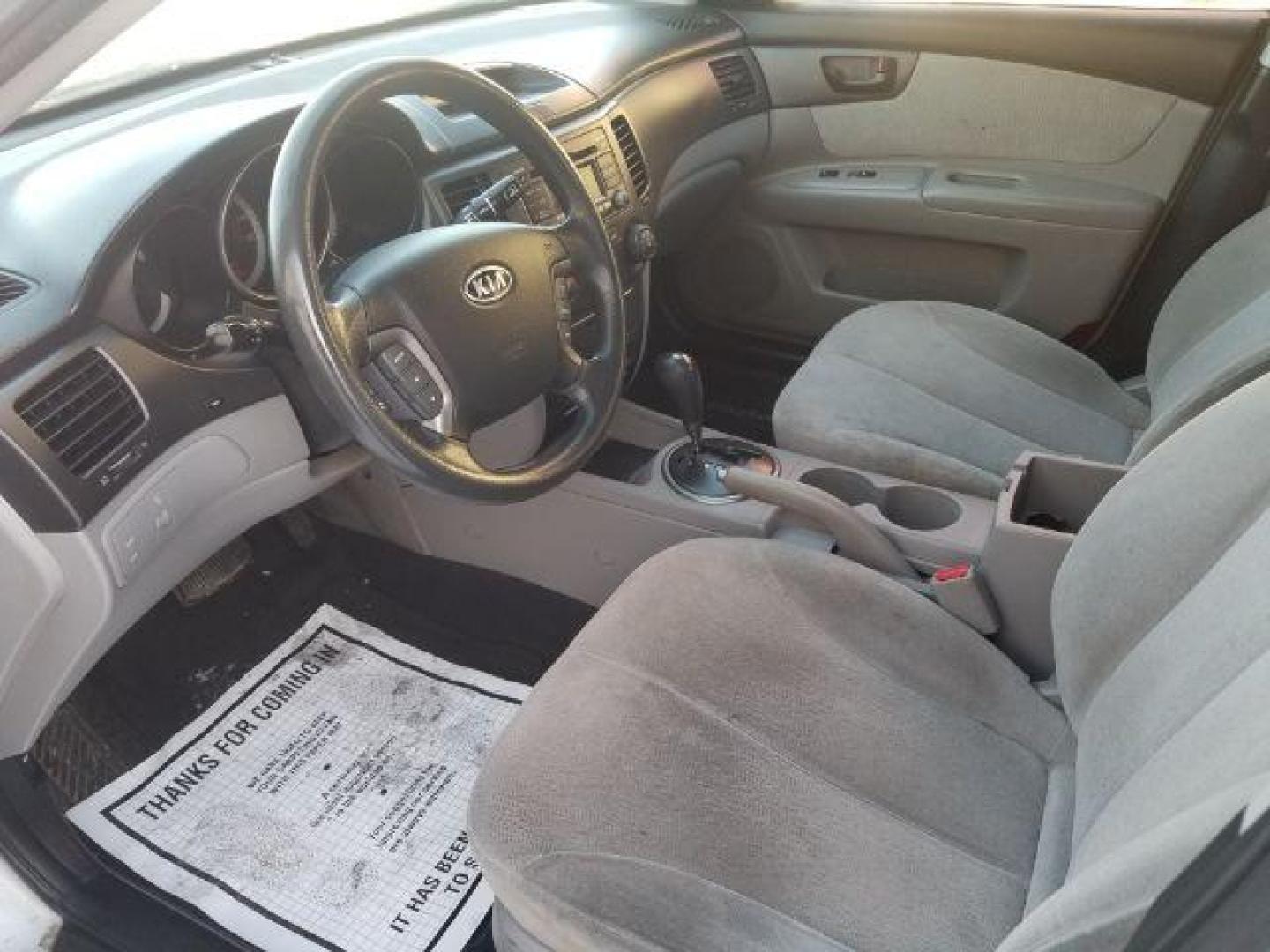 2009 Kia Optima LX (KNAGE228395) with an 2.4L L4 DOHC 16V engine, 4-Speed Automatic transmission, located at 1800 West Broadway, Missoula, 59808, (406) 543-1986, 46.881348, -114.023628 - Photo#7