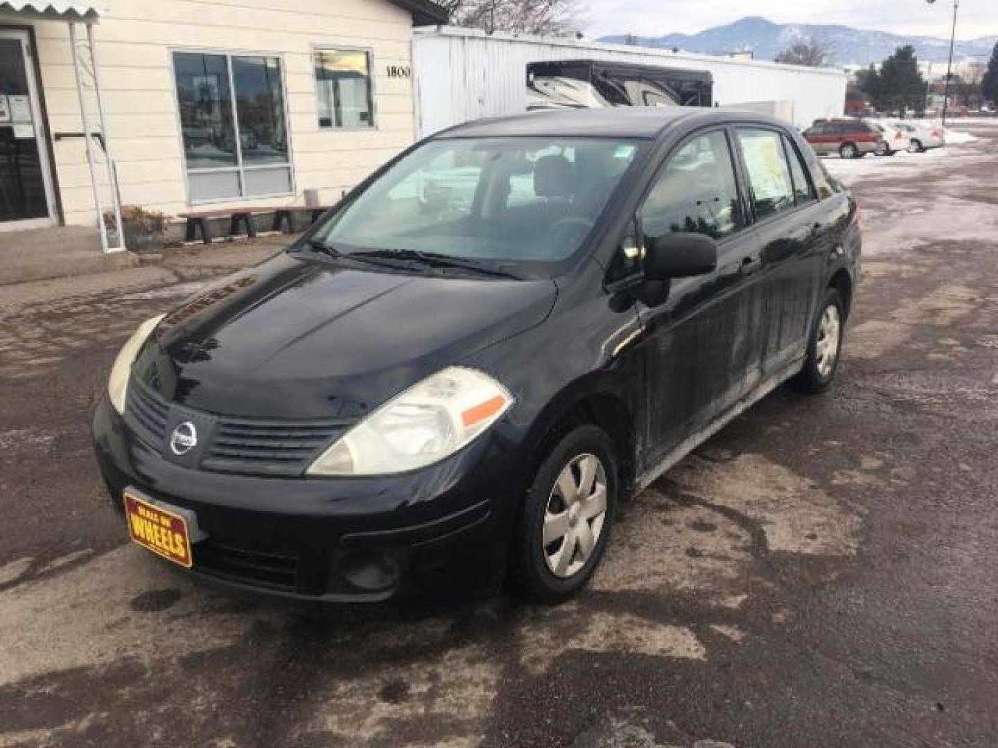 2009 Nissan Versa 1.6 Base Sedan (3N1CC11EX9L) with an 1.6L L4 DOHC 16V engine, Automatic transmission, located at 1800 West Broadway, Missoula, 59808, (406) 543-1986, 46.881348, -114.023628 - Photo#0