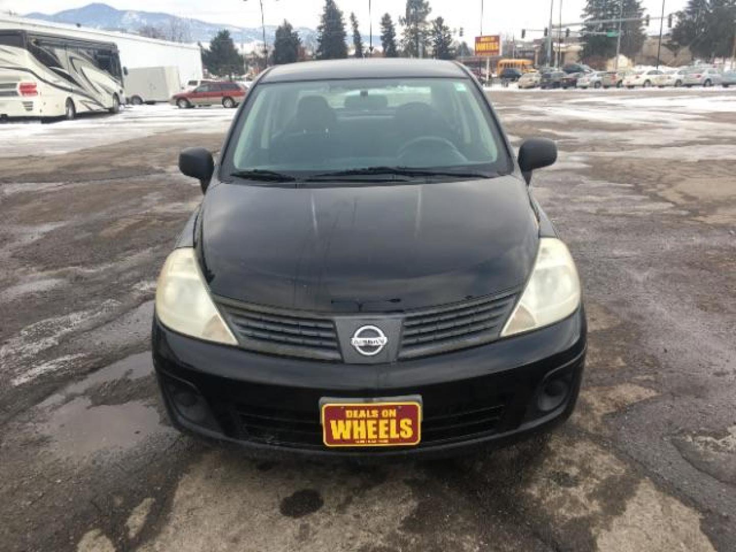 2009 Nissan Versa 1.6 Base Sedan (3N1CC11EX9L) with an 1.6L L4 DOHC 16V engine, Automatic transmission, located at 1800 West Broadway, Missoula, 59808, (406) 543-1986, 46.881348, -114.023628 - Photo#1