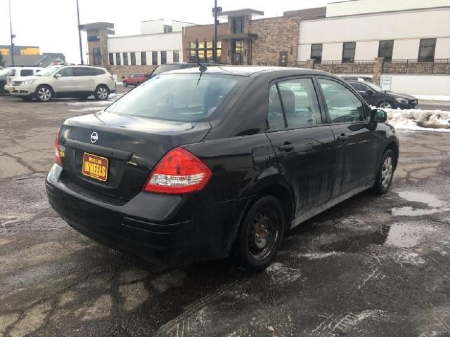 2009 Nissan Versa 1.6 Base Sedan (3N1CC11EX9L) with an 1.6L L4 DOHC 16V engine, Automatic transmission, located at 1800 West Broadway, Missoula, 59808, (406) 543-1986, 46.881348, -114.023628 - Photo#3