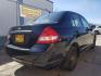 2009 Nissan Versa 1.6 Base Sedan (3N1CC11EX9L) with an 1.6L L4 DOHC 16V engine, Automatic transmission, located at 1800 West Broadway, Missoula, 59808, (406) 543-1986, 46.881348, -114.023628 - Photo#4