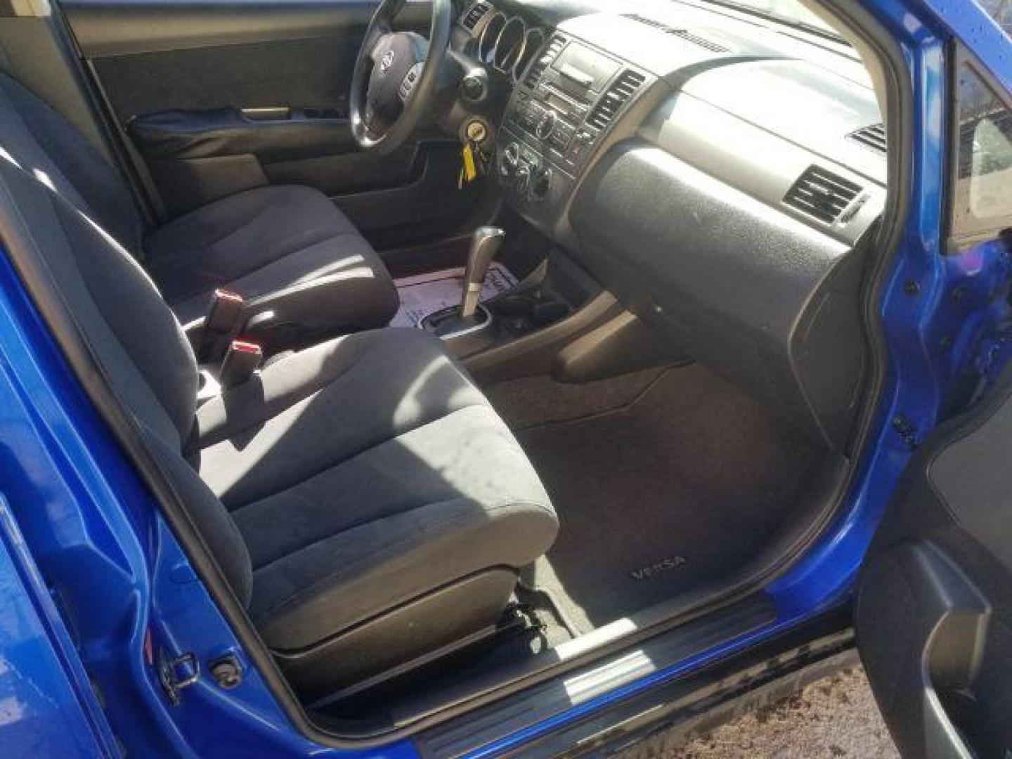 2009 Nissan Versa 1.8S (3N1BC13E19L) with an 1.8L I-4 DOHC engine, located at 1800 West Broadway, Missoula, 59808, (406) 543-1986, 46.881348, -114.023628 - Photo#10