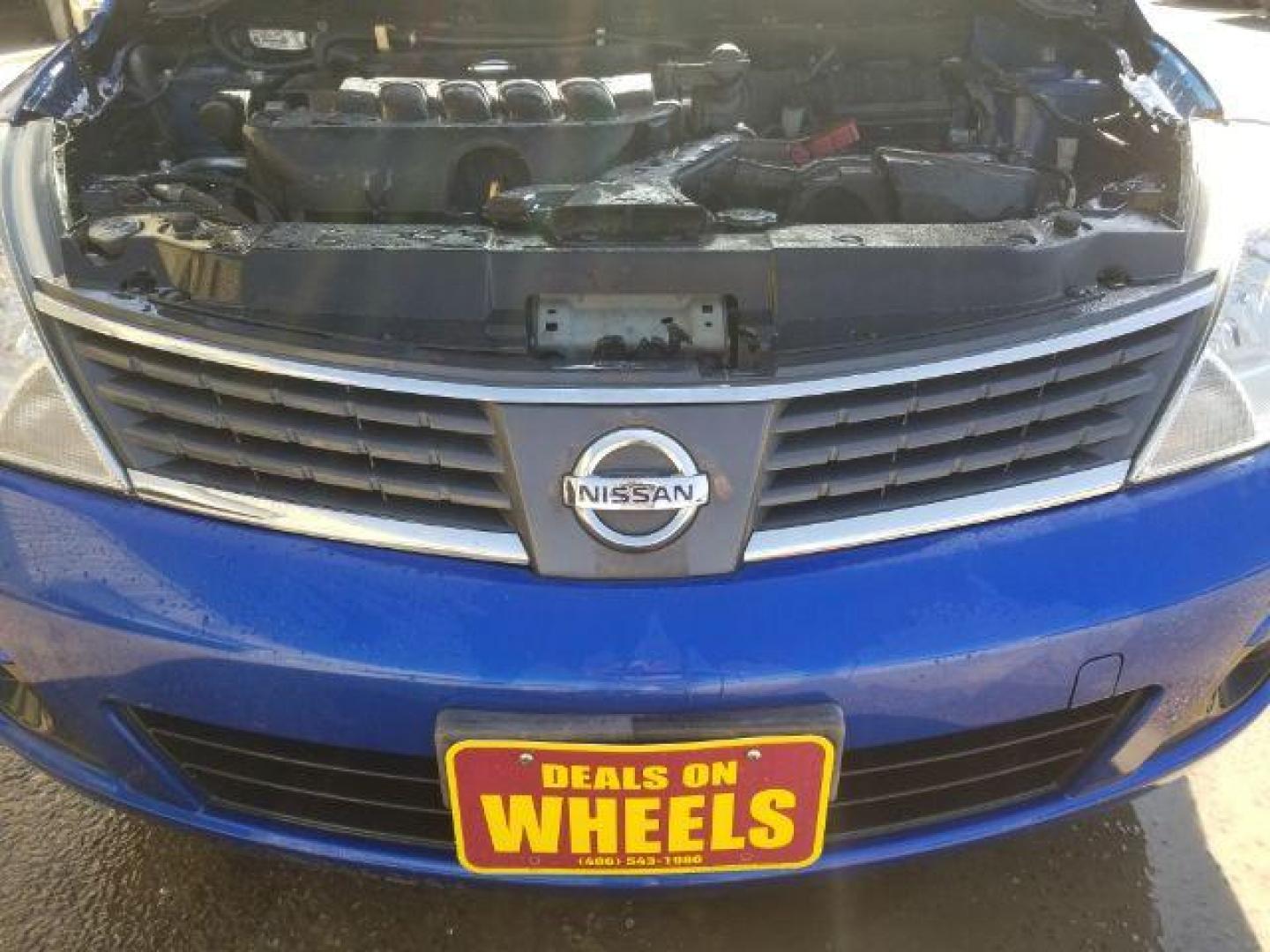 2009 Nissan Versa 1.8S (3N1BC13E19L) with an 1.8L I-4 DOHC engine, located at 1800 West Broadway, Missoula, 59808, (406) 543-1986, 46.881348, -114.023628 - Photo#13