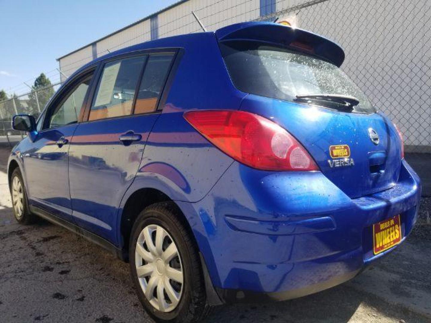 2009 Nissan Versa 1.8S (3N1BC13E19L) with an 1.8L I-4 DOHC engine, located at 1800 West Broadway, Missoula, 59808, (406) 543-1986, 46.881348, -114.023628 - Photo#5