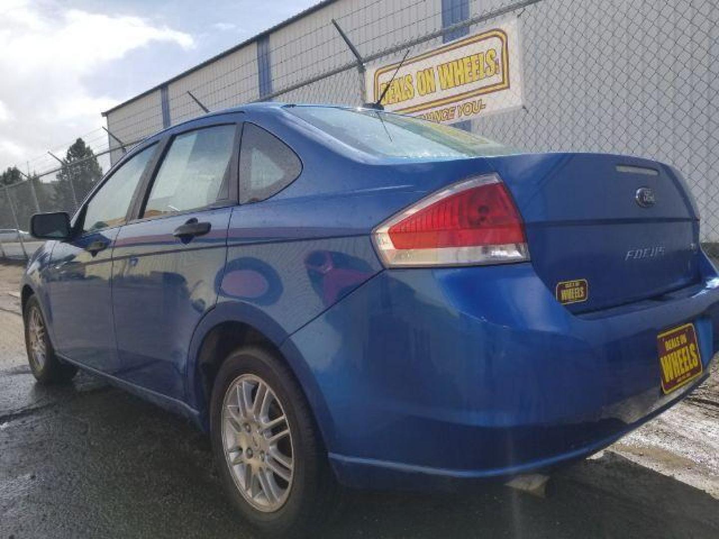 2010 Ford Focus SE Sedan (1FAHP3FN8AW) with an 2.0L L4 DOHC 16V engine, located at 4047 Montana Ave., Billings, MT, 59101, 45.770847, -108.529800 - Photo#5
