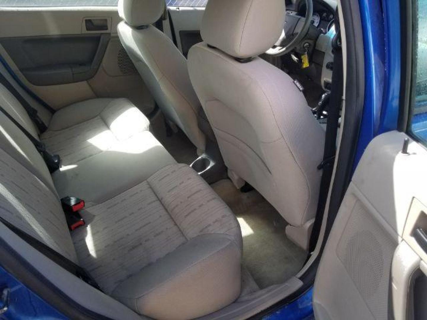 2010 Ford Focus SE Sedan (1FAHP3FN8AW) with an 2.0L L4 DOHC 16V engine, located at 4047 Montana Ave., Billings, MT, 59101, 45.770847, -108.529800 - Photo#9
