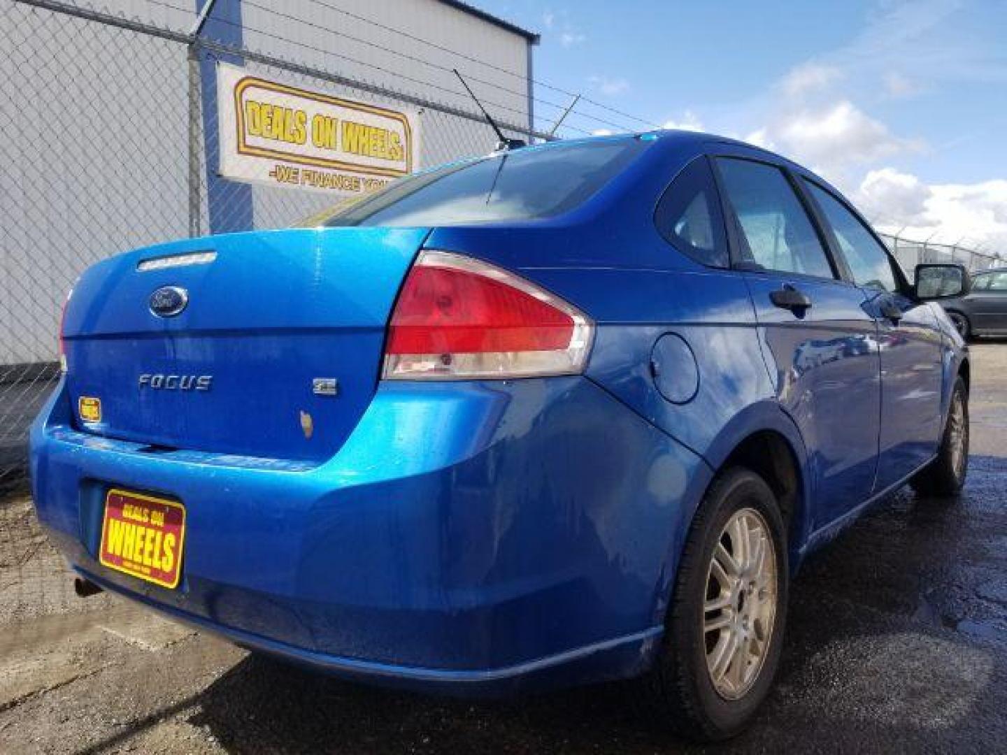 2010 Ford Focus SE Sedan (1FAHP3FN8AW) with an 2.0L L4 DOHC 16V engine, located at 4047 Montana Ave., Billings, MT, 59101, 45.770847, -108.529800 - Photo#4