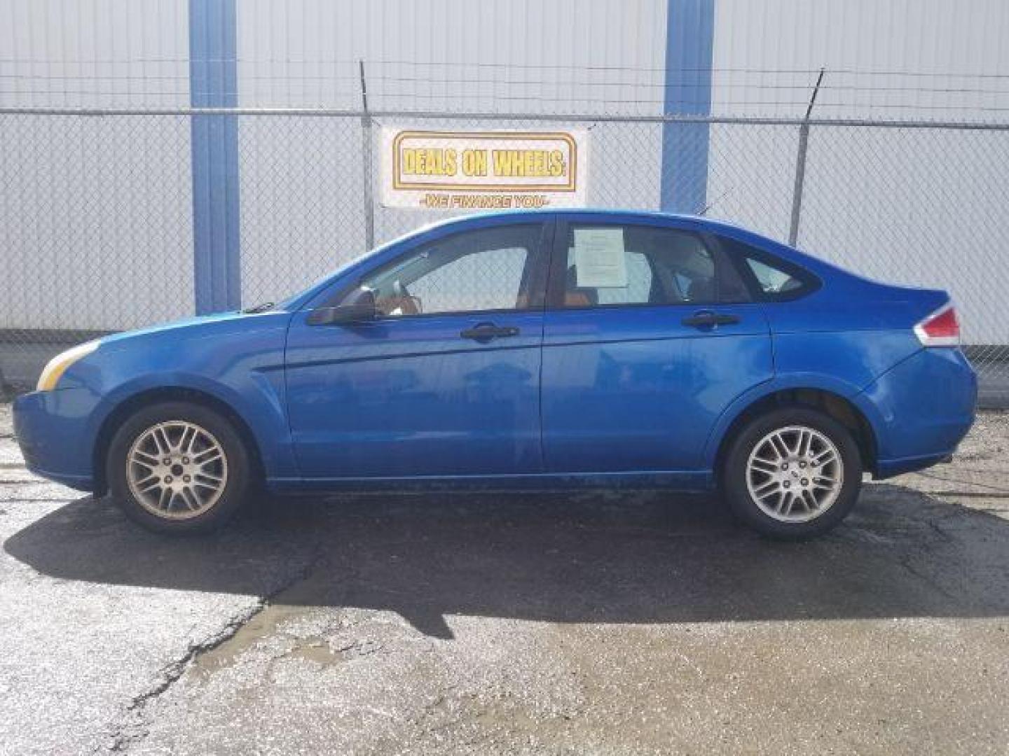 2010 Ford Focus SE Sedan (1FAHP3FN8AW) with an 2.0L L4 DOHC 16V engine, located at 4047 Montana Ave., Billings, MT, 59101, 45.770847, -108.529800 - Photo#6