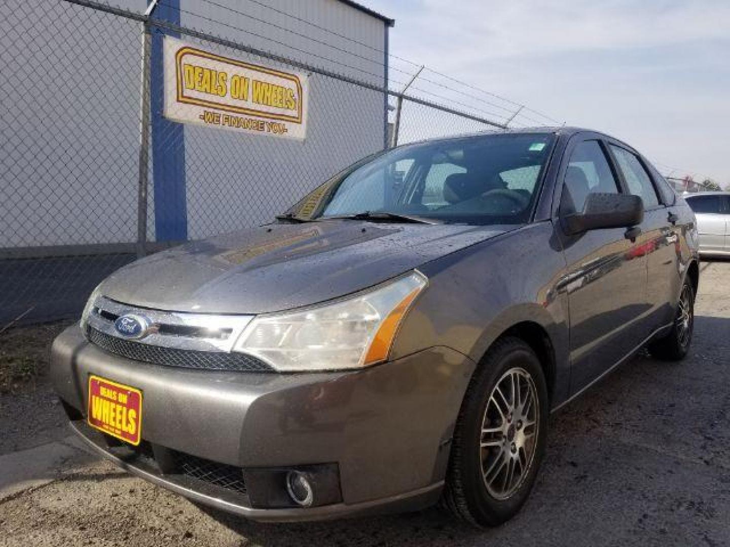 2010 Ford Focus SE Sedan (1FAHP3FNXAW) with an 2.0L L4 DOHC 16V engine, located at 4047 Montana Ave., Billings, MT, 59101, 45.770847, -108.529800 - Photo#0