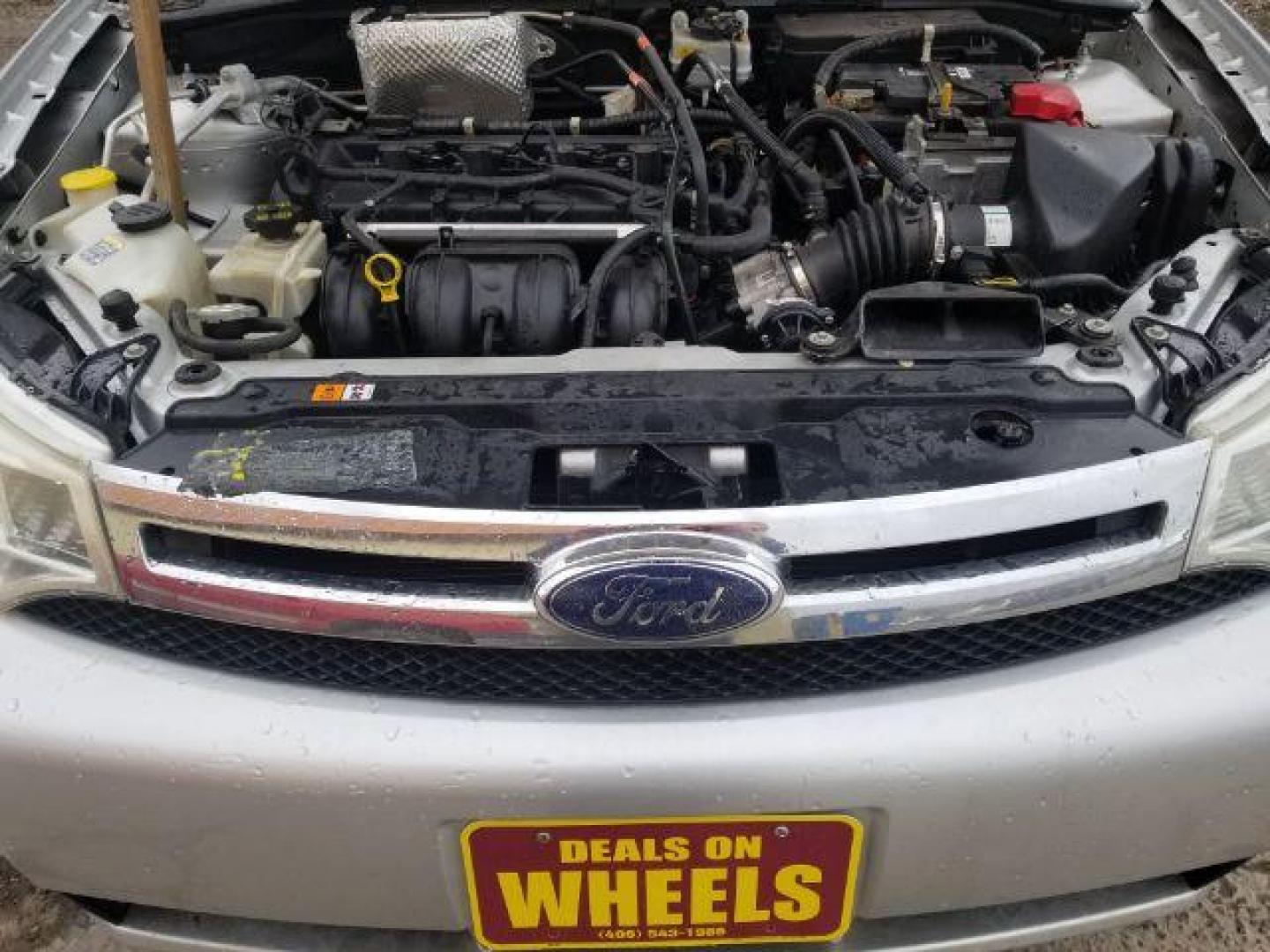 2010 Ford Focus SE (1FAHP3FN5AW) with an Duratec 2L I-4 DOHC engine, located at 4047 Montana Ave., Billings, MT, 59101, 45.770847, -108.529800 - Photo#13