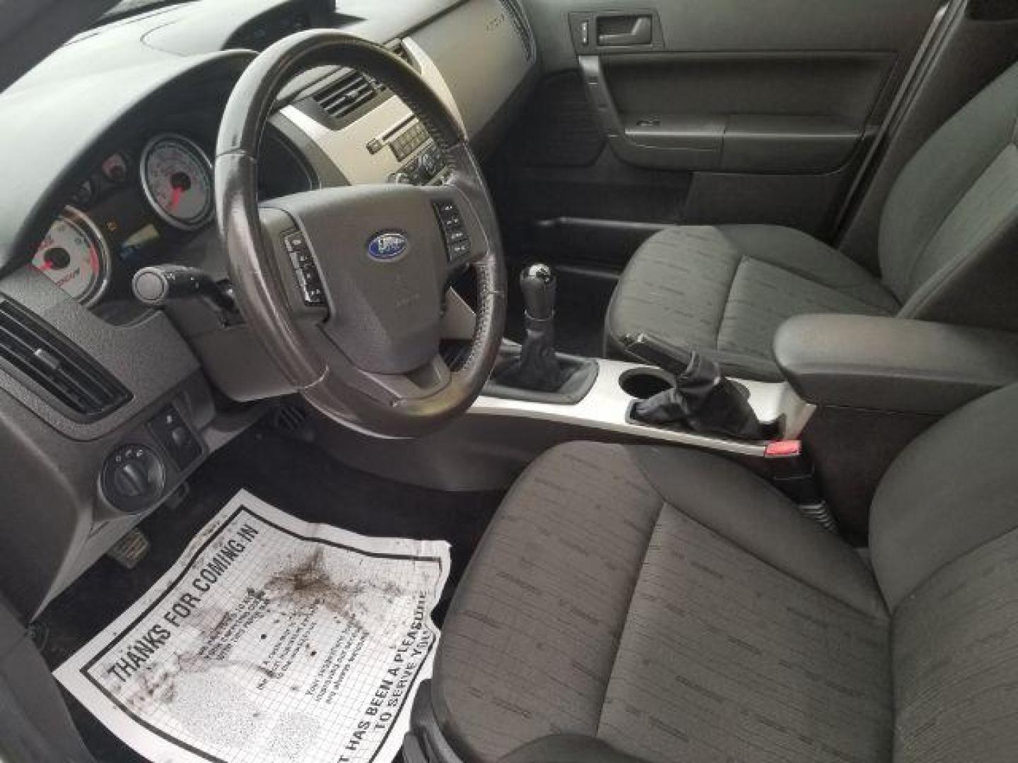 2010 Ford Focus SE (1FAHP3FN5AW) with an Duratec 2L I-4 DOHC engine, located at 4047 Montana Ave., Billings, MT, 59101, 45.770847, -108.529800 - Photo#7