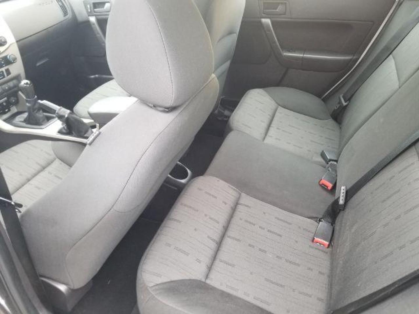 2010 Ford Focus SE (1FAHP3FN5AW) with an Duratec 2L I-4 DOHC engine, located at 4047 Montana Ave., Billings, MT, 59101, 45.770847, -108.529800 - Photo#8