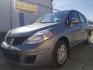 2010 Nissan Versa 1.8S (3N1BC1CP9AL) with an 1.8L I-4 DOHC engine, located at 4801 10th Ave S,, Great Falls, MT, 59405, 0.000000, 0.000000 - Photo#0