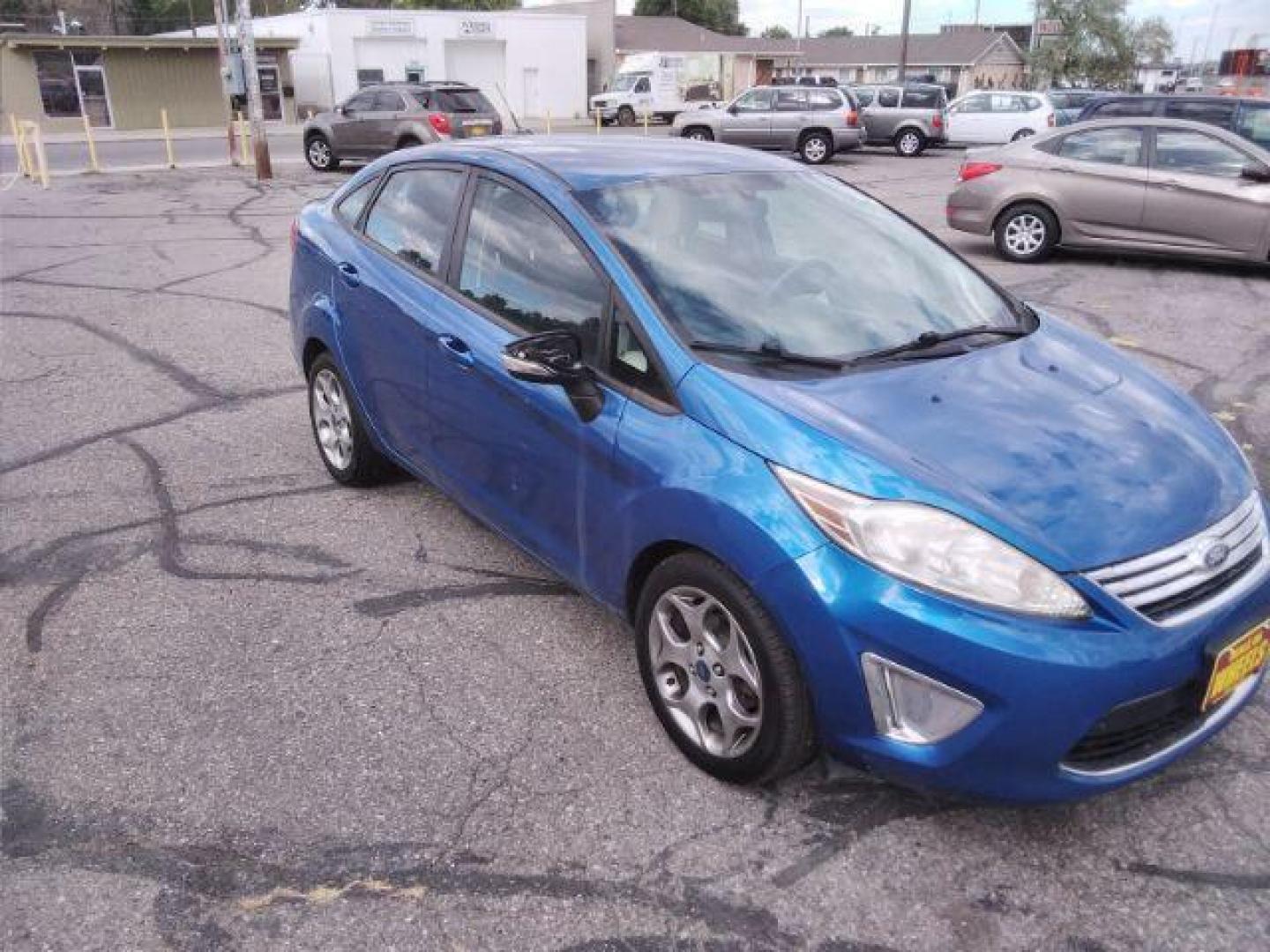 2011 Ford Fiesta SEL Sedan (3FADP4CJ7BM) with an 1.6L L4 DOHC 16V engine, located at 4047 Montana Ave., Billings, MT, 59101, 45.770847, -108.529800 - Photo#2
