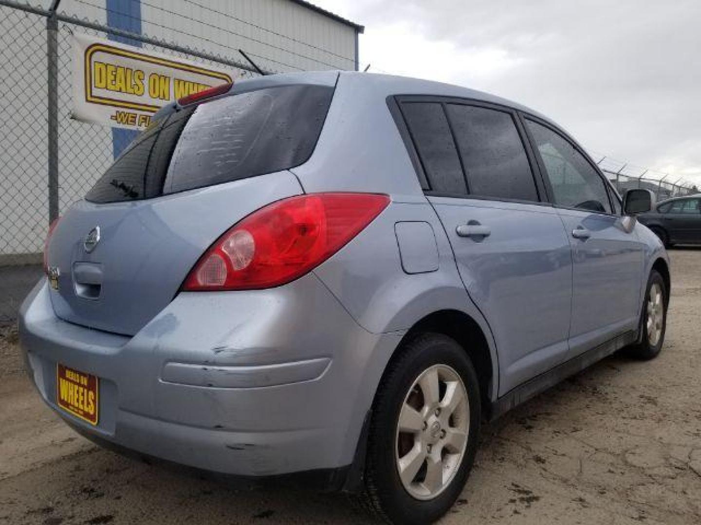 2011 Nissan Versa 1.8 SL Hatchback (3N1BC1CP9BL) with an 1.8L L4 DOHC 16V engine, Continuously Variabl transmission, located at 1821 N Montana Ave., Helena, MT, 59601, (406) 422-1031, 0.000000, 0.000000 - Photo#4