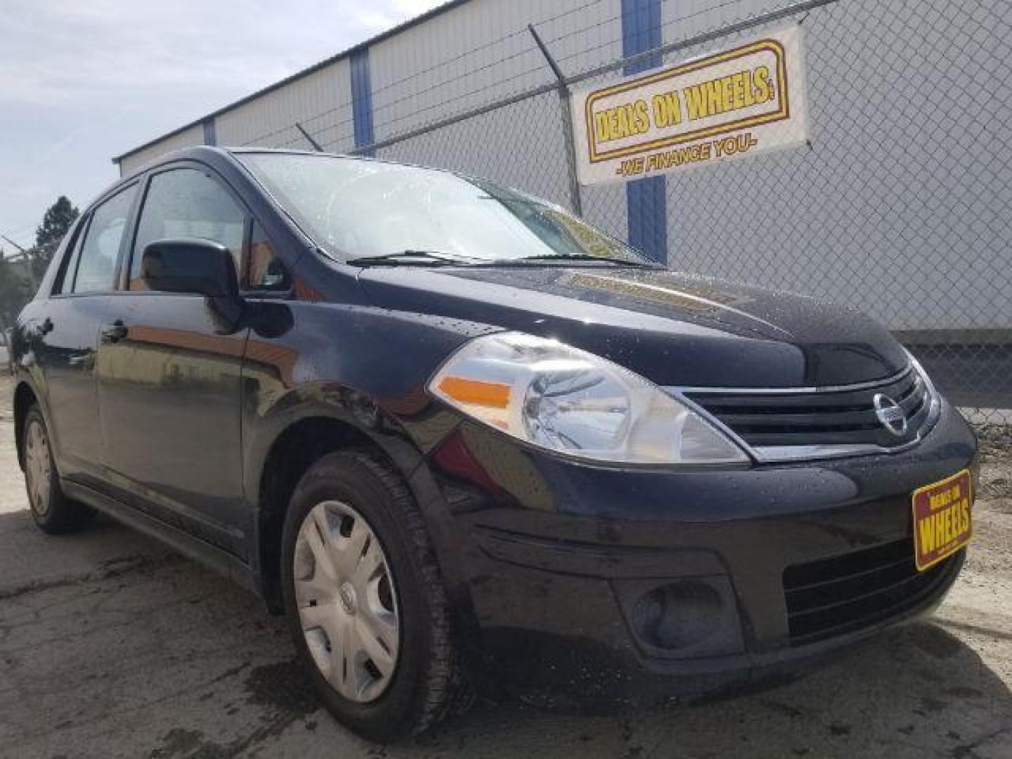 2011 Nissan Versa 1.8S (3N1BC1APXBL) with an 1.8L I-4 DOHC engine, located at 601 E. Idaho St., Kalispell, MT, 59901, 0.000000, 0.000000 - Photo#0